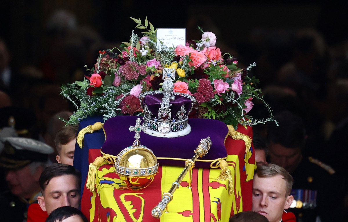 The coffin of Britain's Queen Elizabeth is carried out of the Westminster Abbey.