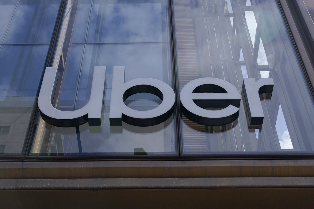 An Uber sign is displayed at the company's headquarters in San Francisco, Monday, Sept. 12, 2022. (Jeff Chiu—AP/File)