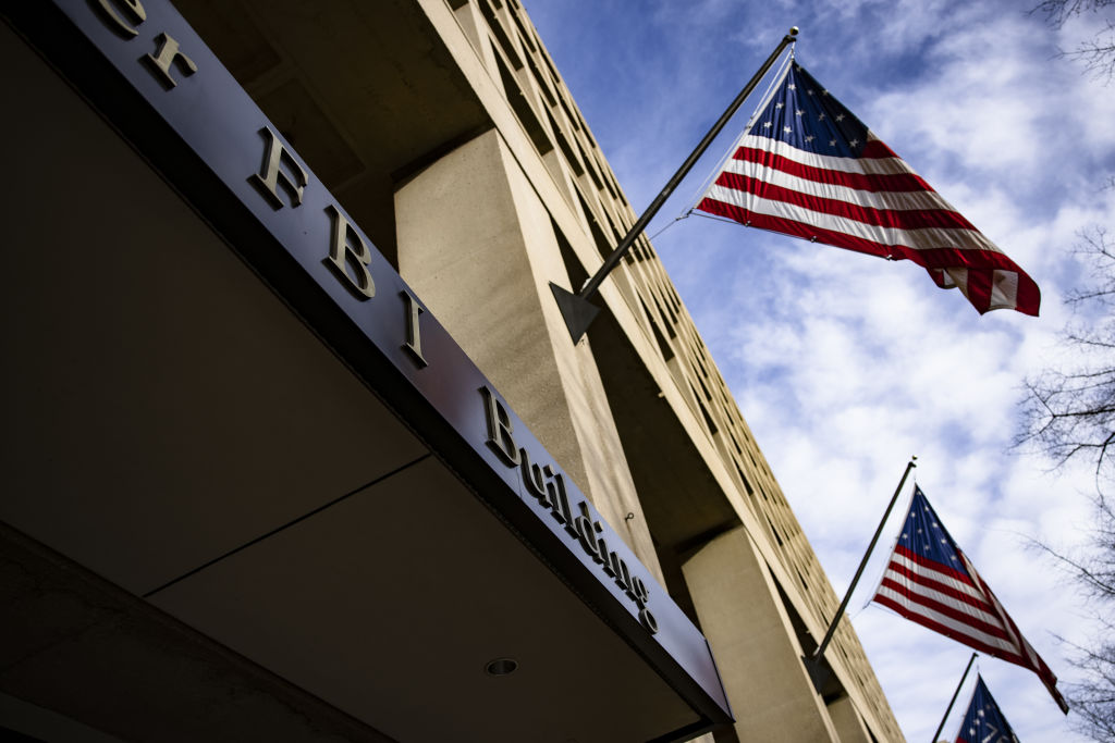 American flags fly outside the Federal Bureau of Investigation (FBI) headquarters in Washington, D.C., U.S., on Saturday, Jan. 2, 2021. The FBI has released its 2021 crime statistics. (Samuel Corum—Getty)