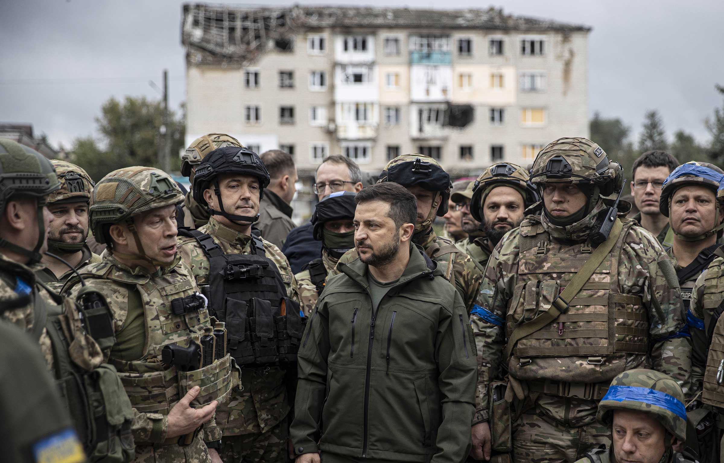 Ukrainian President Volodymyr Zelensky attends a flag hoisting ceremony in Izyum after the Ukrainian forces took back control of the city from the Russians. (Metin Aktas–Anadolu Agency/Getty Images)