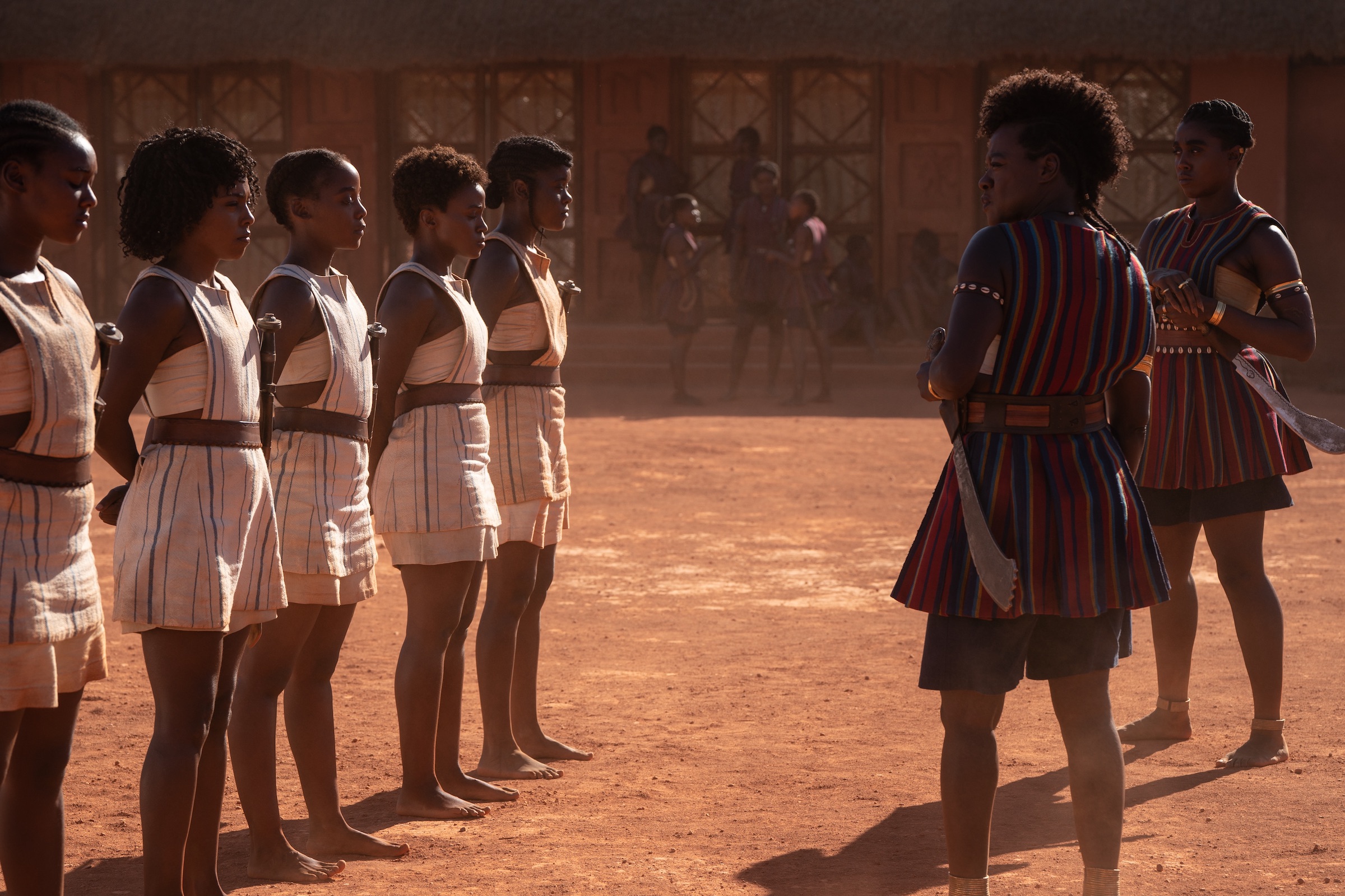General Nanisca (Viola Davis) and Izogie (Lashana Lynch) with young Agojie recruits (Ilze Kitshoff—Sony Pictures Entertainment)