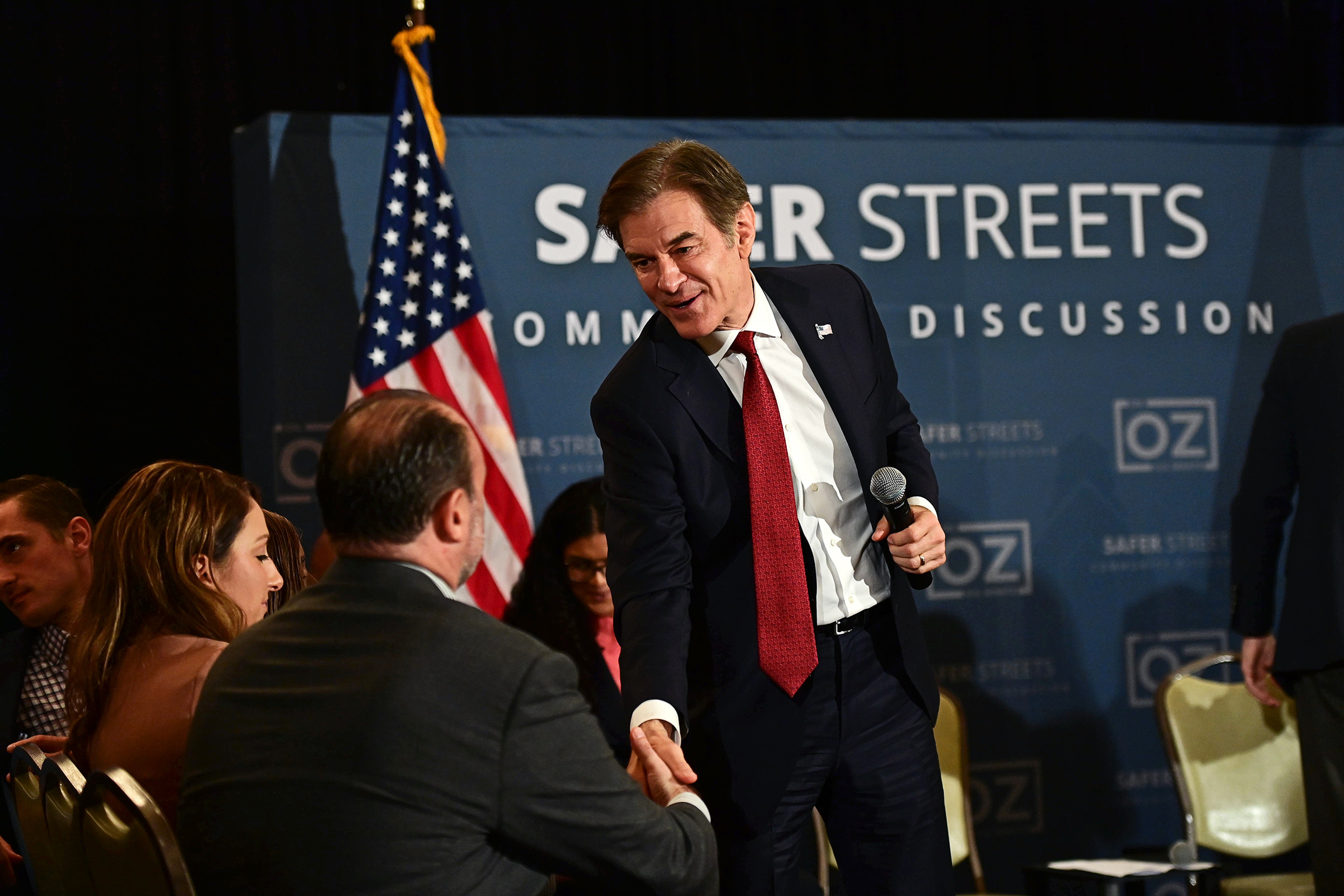 Oz, with supporters on Oct. 13, has made crime a centerpiece of his closing pitch. (Mark Makela—Getty Images)