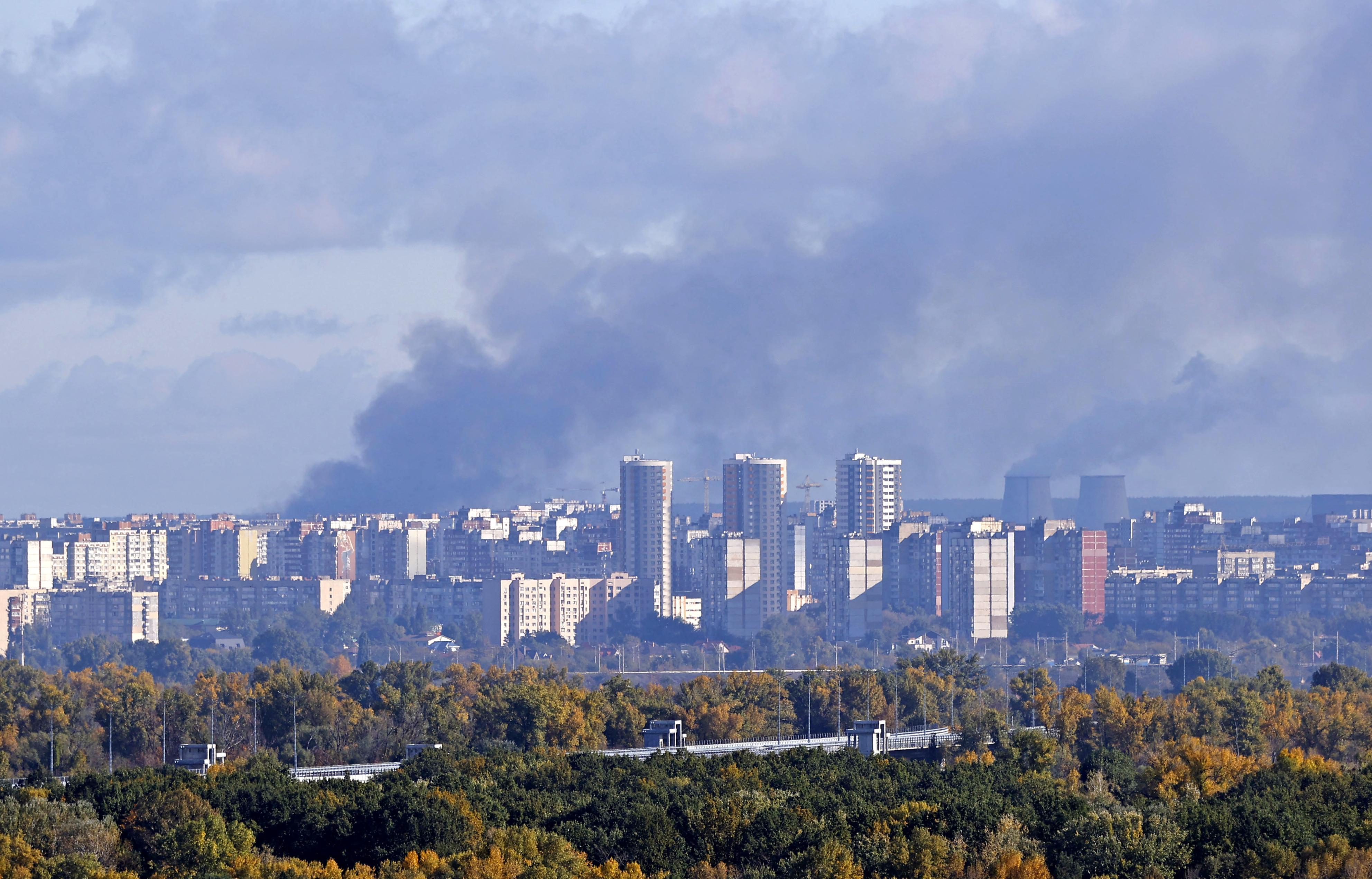 Black smoke rises over Ukraine's capital Kyiv on Oct. 10, 2022, following Russian missile attacks earlier in the day. (Kyodo/AP)