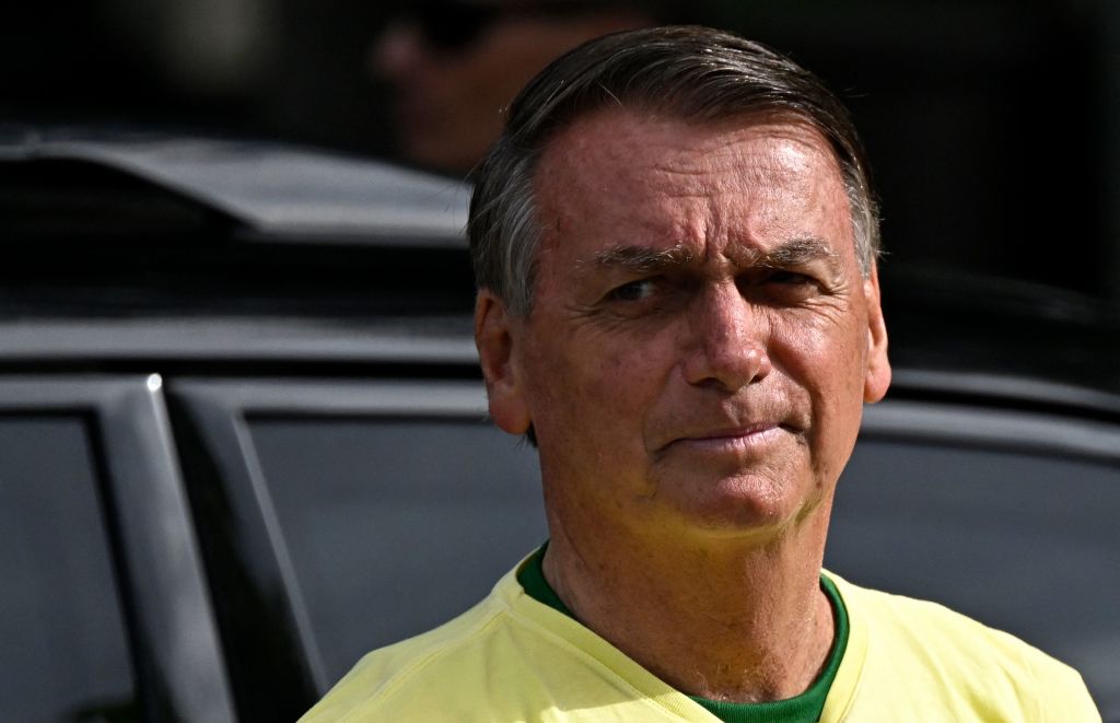 Brazilian President and re-election candidate Jair Bolsonaro arrives to vote at a polling station in Rio de Janeiro, Brazil, on Oct. 30, 2022, during the presidential run-off election. (Mauro Pimentel—AFP/Getty Images)