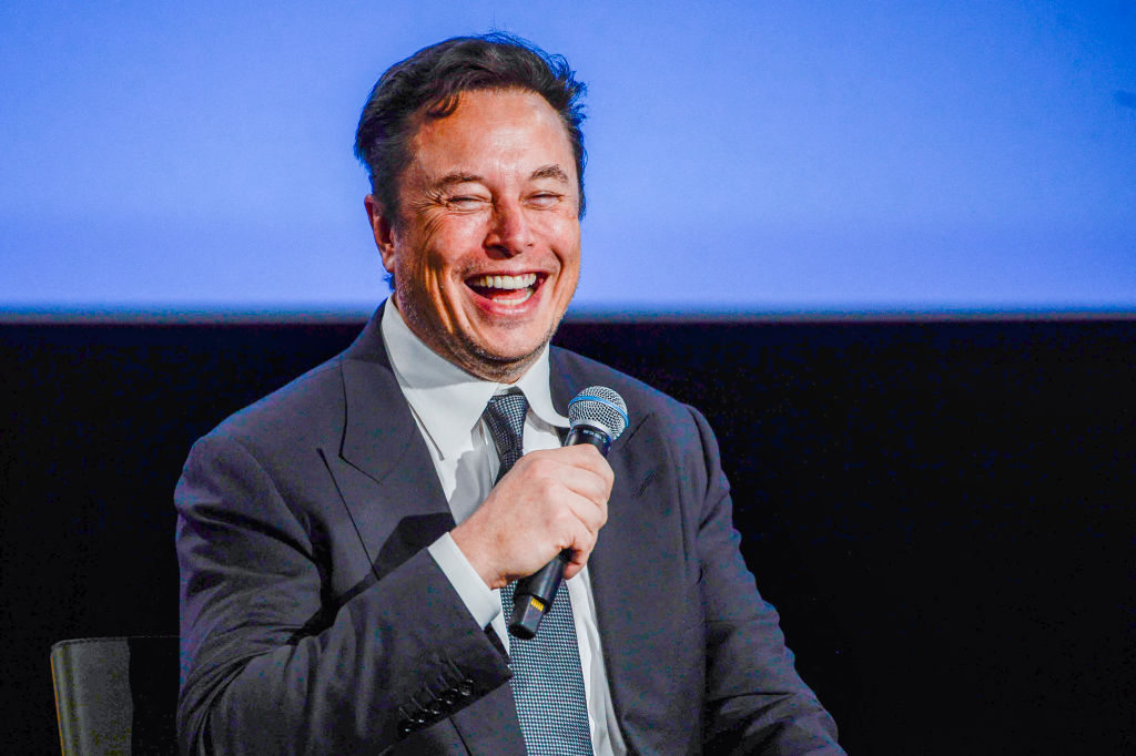 Tesla CEO Elon Musk smiles as he addresses guests at the Offshore Northern Seas 2022 (ONS) meeting in Stavanger, Norway on August 29, 2022. (CARINA JOHANSEN—NTB/AFP/Getty Images)