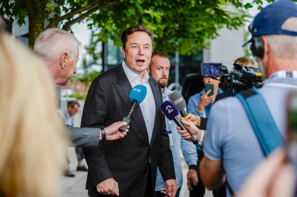 Tesla CEO Elon Musk gives interviews as he arrives at the Offshore Northern Seas 2022 meeting in Stavanger, Norway on August 29, 2022. (CARINA JOHANSEN—NTB/AFP/Getty Images)