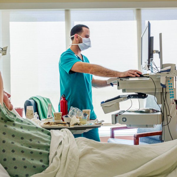 Miami Beach, Florida, Mount Sinai Medical Center, patient with male man RN nurse.