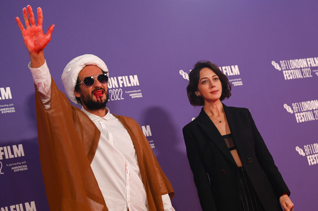 'Holy Spider' director Ali Abbasi and lead actress Zar Amir Ebrahimi attend the U.K. premiere during the 66th BFI London Film Festival at the Southbank Centre on Oct. 8, 2022 in London, England. The movie debuts in the U.S. on Oct. 28. (Stuart C. Wilson—Getty Images for BFI)