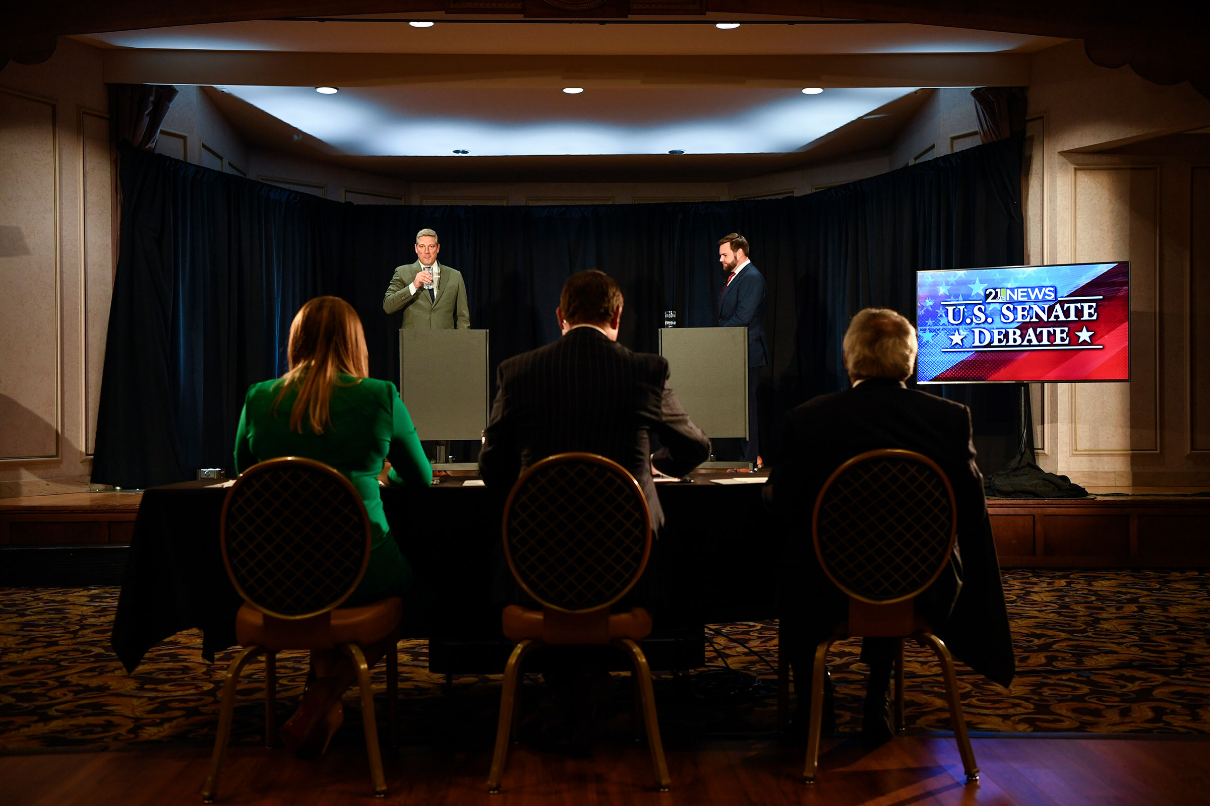 Senate candidates Rep. Tim Ryan (D-Ohio), left, and Republican JD Vance, await the start of their second debate in Youngstown, Ohio, on Monday, Oct. 17, 2022. (Gaelen Morse/The New York Times)