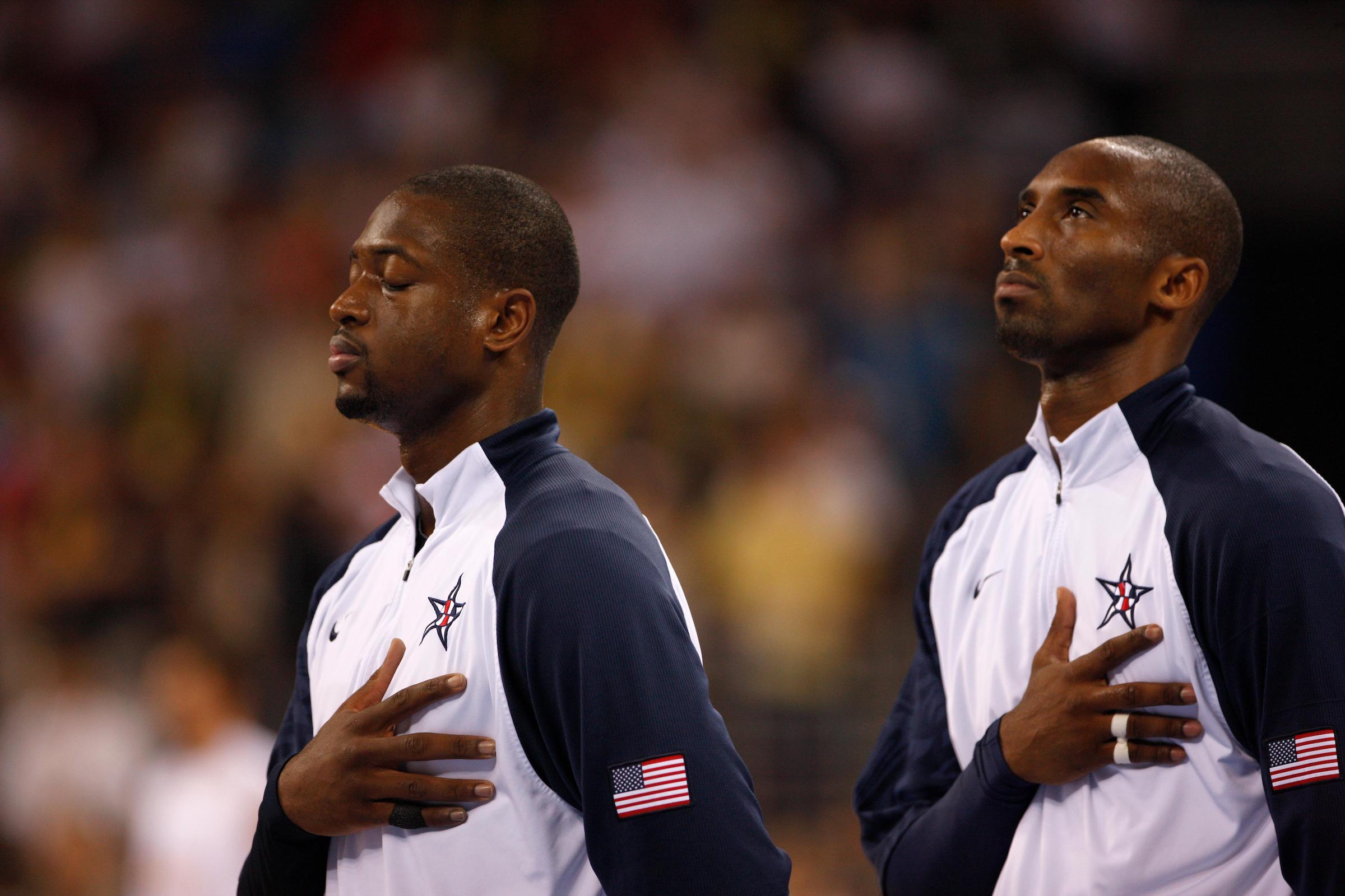 Beijing 2008 OG, Basketball Men - Final, United States of America (USA) 1st - Spain (ESP) 2nd, Dwyane WADE and Kobe BRYANT (USA) with their hands on their hearts.