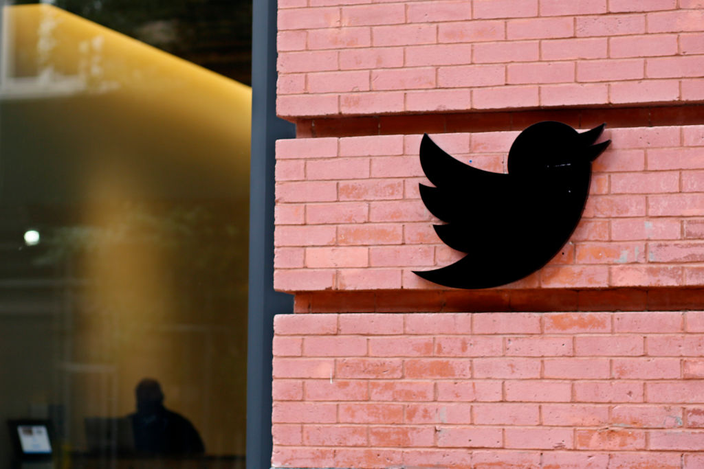 The logo of Twitter is displayed at the company Headquarters on October 28, 2022 in New York City. A day after Elon Musk completed Twitter takeover the U.S. Securities and Exchange Commission notified its intention of delisted the company from the New York Stock Exchange according to a new filing with the U.S. Securities and Exchange Commission. (Leonardo Munoz–VIEWpress/Corbis/Getty Images)