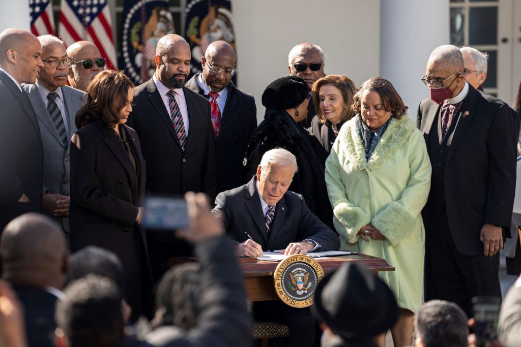 U.S. President Joe Biden signs the Emmett Till Anti-Lynching Act in the Rose Garden of the White House in Washington, D.C., on March 29, 2022. (Liu Jie—Xinhua News Agency via Getty Images)