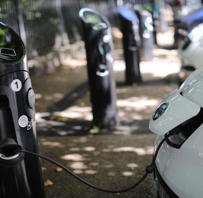 A charging plug connects an electric vehicle to a charging station on Aug. 17, 2017 in London, England.