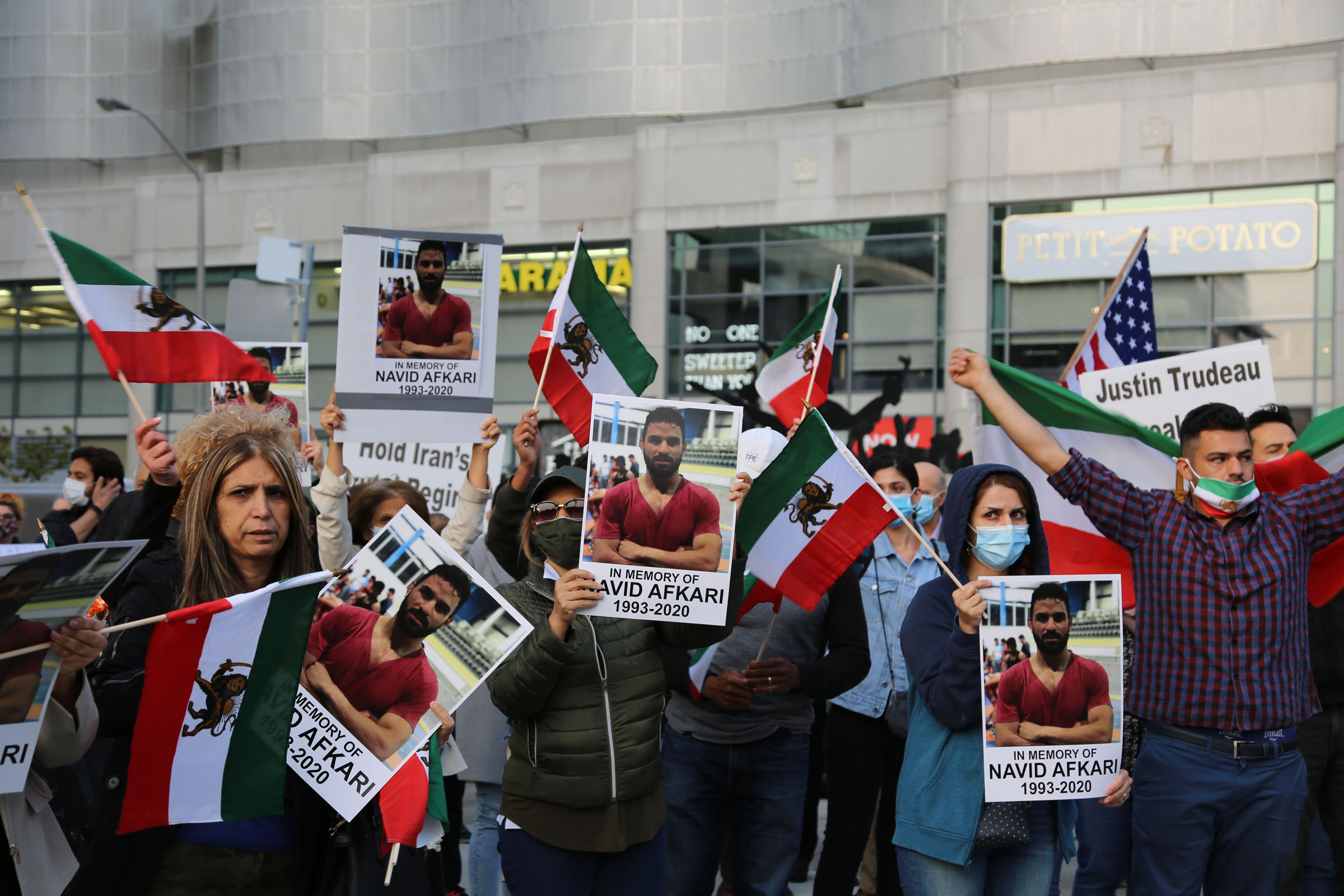 Iranians in Canada demonstrate against the execution of wrestler Navid Afkari by the Iranian regime, in Toronto, on Sept. 15, 2020.