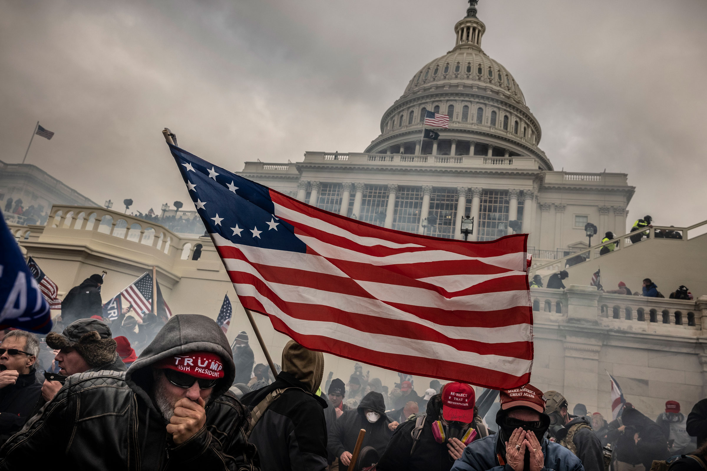 Supporters of President Trump who are trying to overturn the results of the 2020 presidential election clash with police, as the crowd storms up the west side steps of the U.S. Capitol, on Jan. 6, 2021. (David Butow—Redux)
