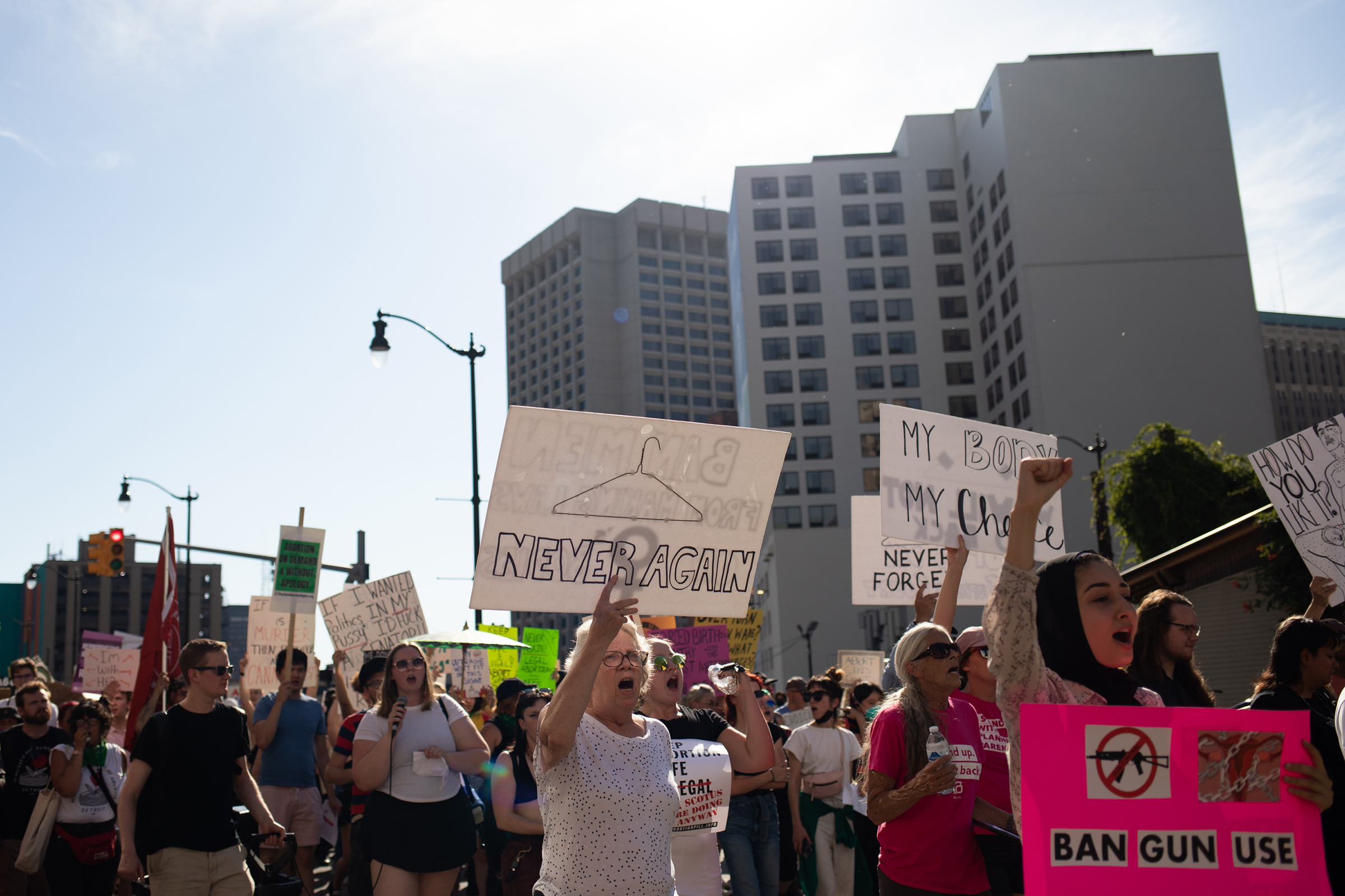Abortion rights demonstrators march through the streets to protest the Supreme Court's decision in the Dobbs v. Jackson Women's Health case on June 24 in Detroit, Mich. (Emily Elconin—Getty Images)