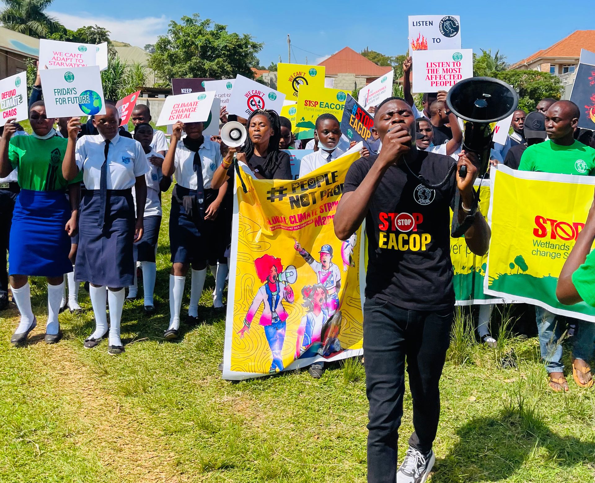 Nyombi Morris leads a protest against the 'East African Crude Oil Pipeline' project on March 25, 2022 at Mutundwe Young Christian Secondary School in Kirinyabigo, Kampala Uganda. (Courtesy of Nyombi Morris)