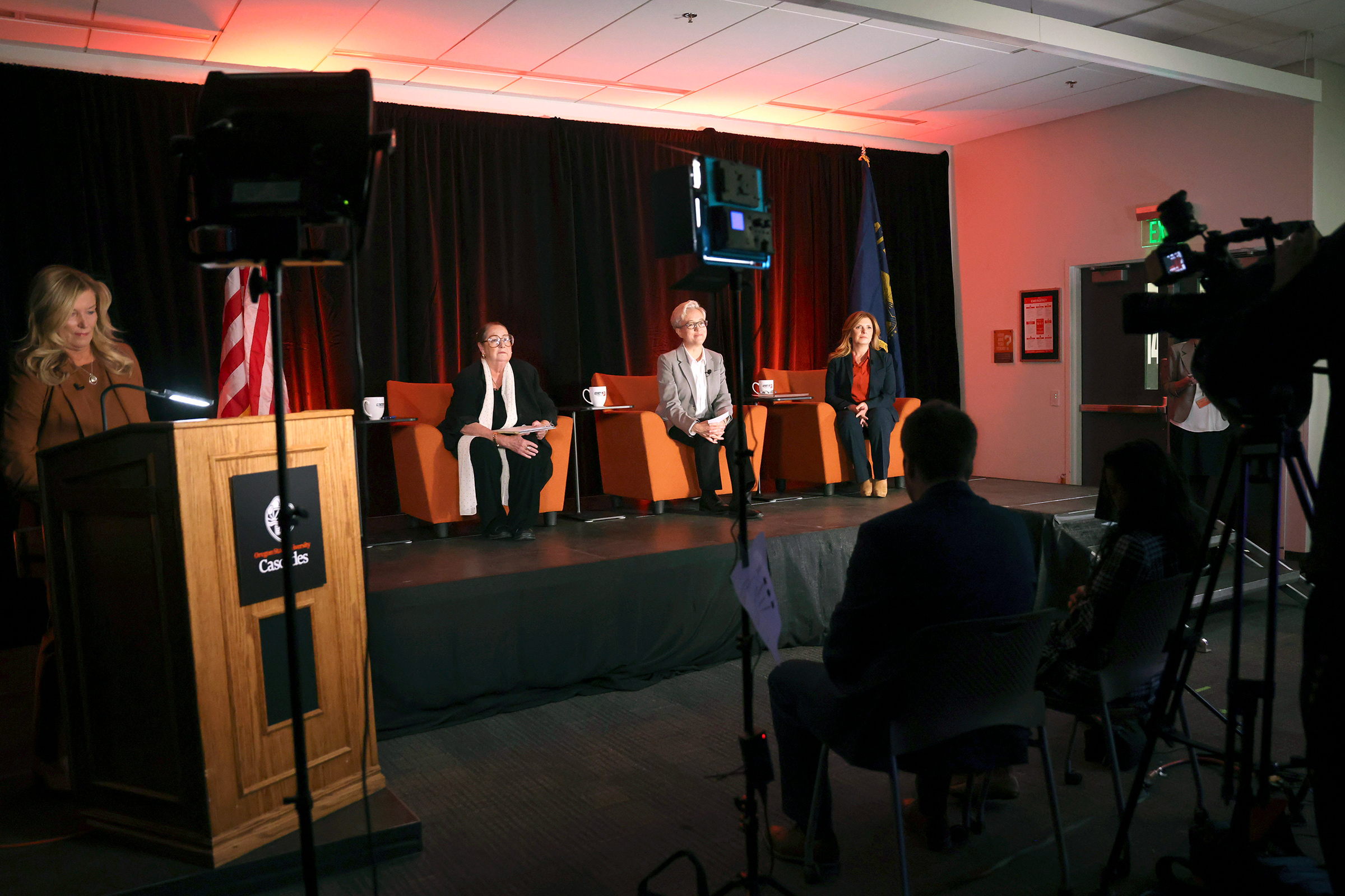 Oregon governor candidates — seated from left — Betsy Johnson, Tina Kotek and Christine Drazan prepare for a debate at Oregon State University on Sept. 27, 2022. (Dean Guernsey—The Bulletin/AP)