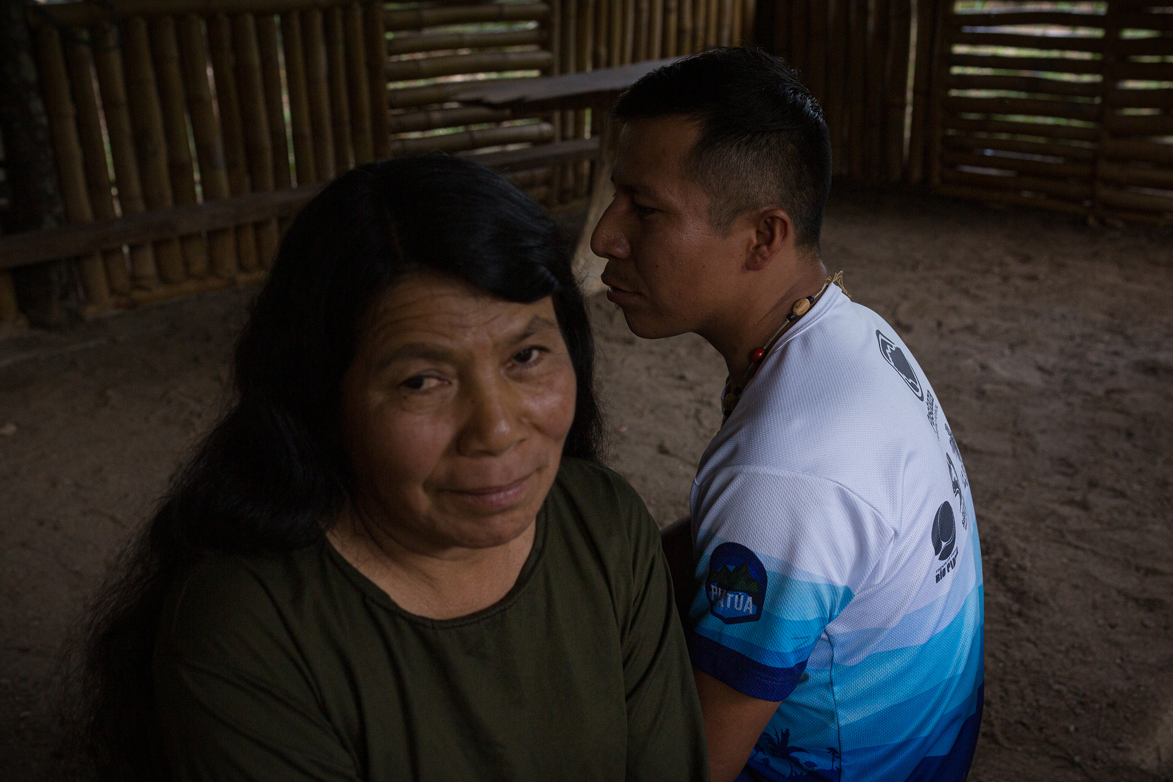 Pablo and his mother Inés Alvarado are residents of the Yayayaku community. They live next to the river and are pictured in their home. (Andrés Yépez for TIME)