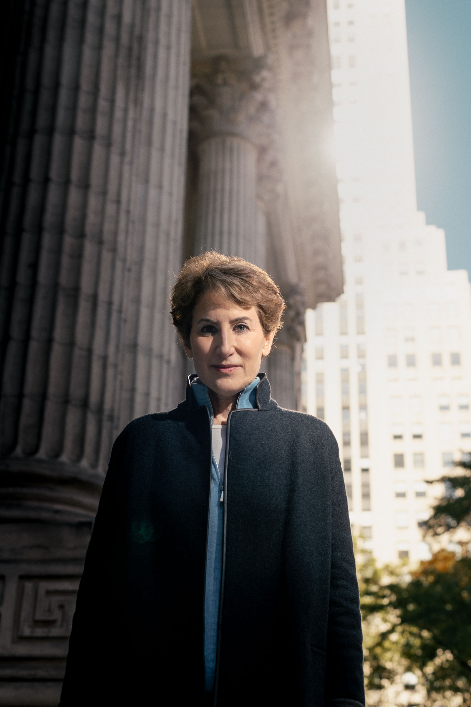 portrait of Stacy Schiff in front of the New York Public Library