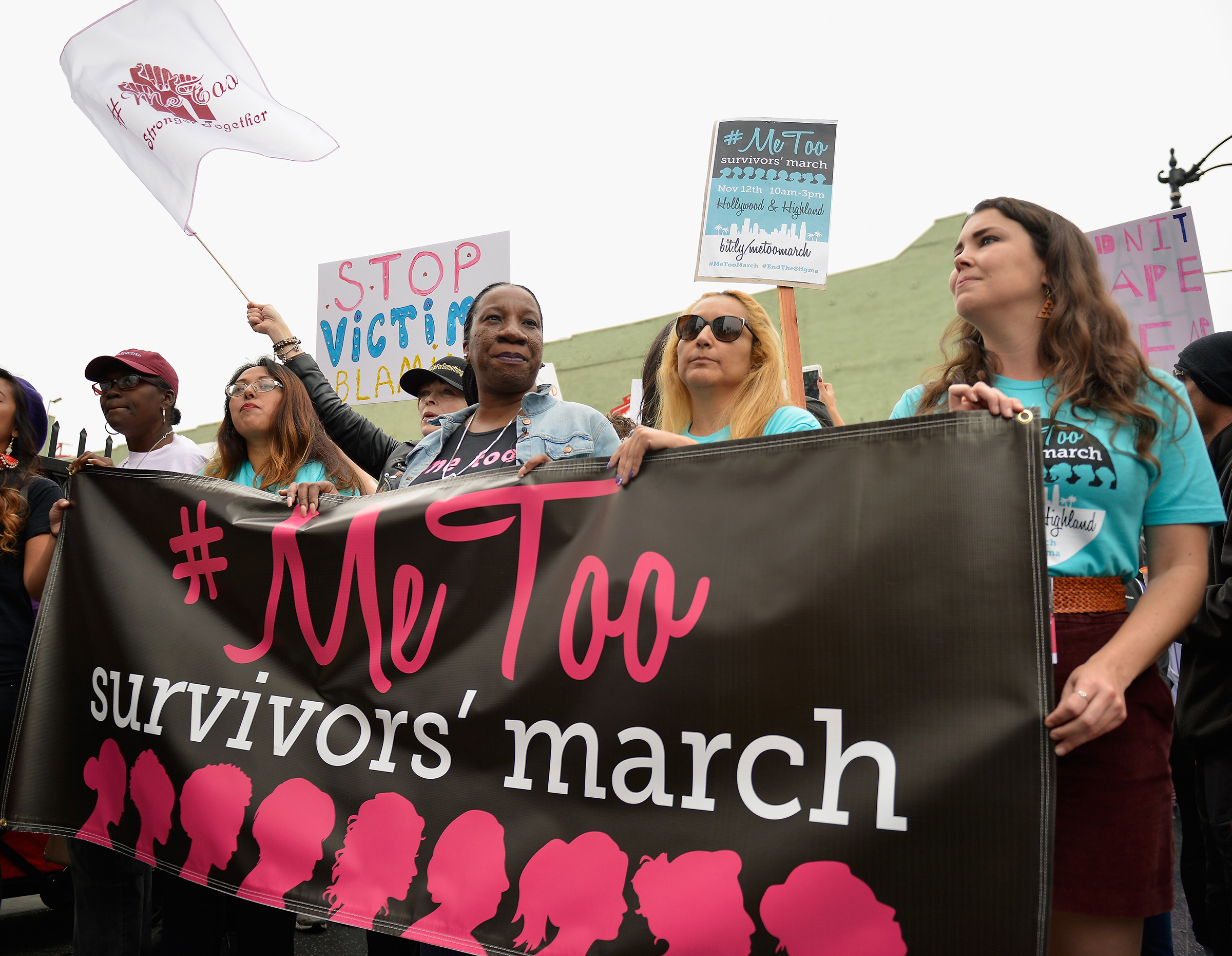 Tarana Burke, center, seen at Take Back The Workplace March And #MeToo Survivors March &amp; Rally on Nov. 12, 2017 in Hollywood, Calif. (Chelsea Guglielmino—FilmMagic/Getty Images)