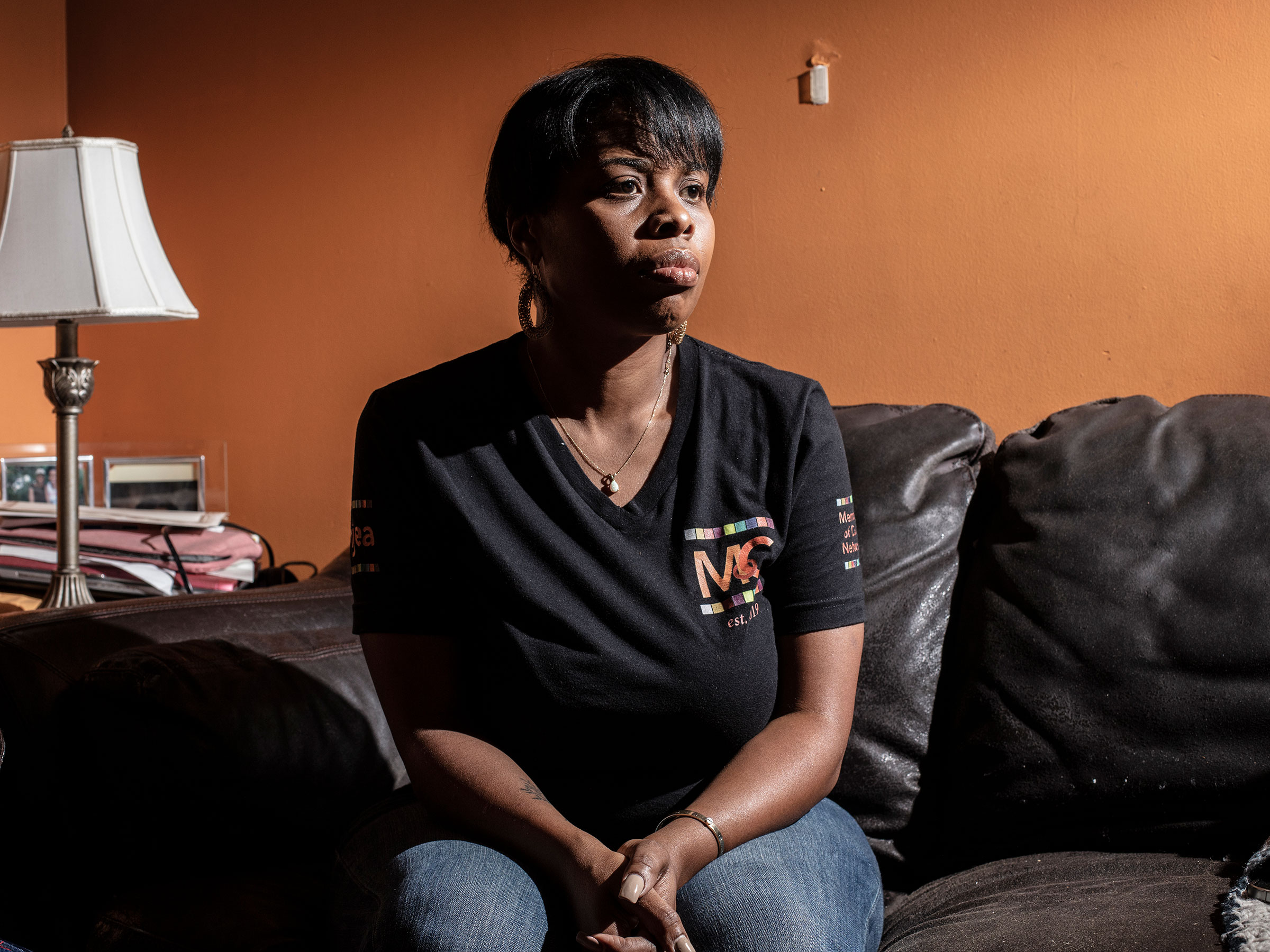 Shaye Brown in her home in Paterson, N.J., on Oct. 5. Brown resigned as a special education teacher in Paterson Public Schools for a higher salary at a neighboring district. She knows leaving will make Paterson's teacher shortage worse; her 9-year-old son's class in the district lacks a permanent teacher. (Bryan Anselm for TIME)