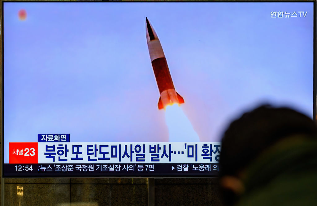 A TV screen shows a file image of North Korea's missile launch during a news program at the Yongsan Railway Station in Seoul, Nov. 17, 2022. (Kim Jae-Hwan—SOPA Images/LightRocket/Getty Images)
