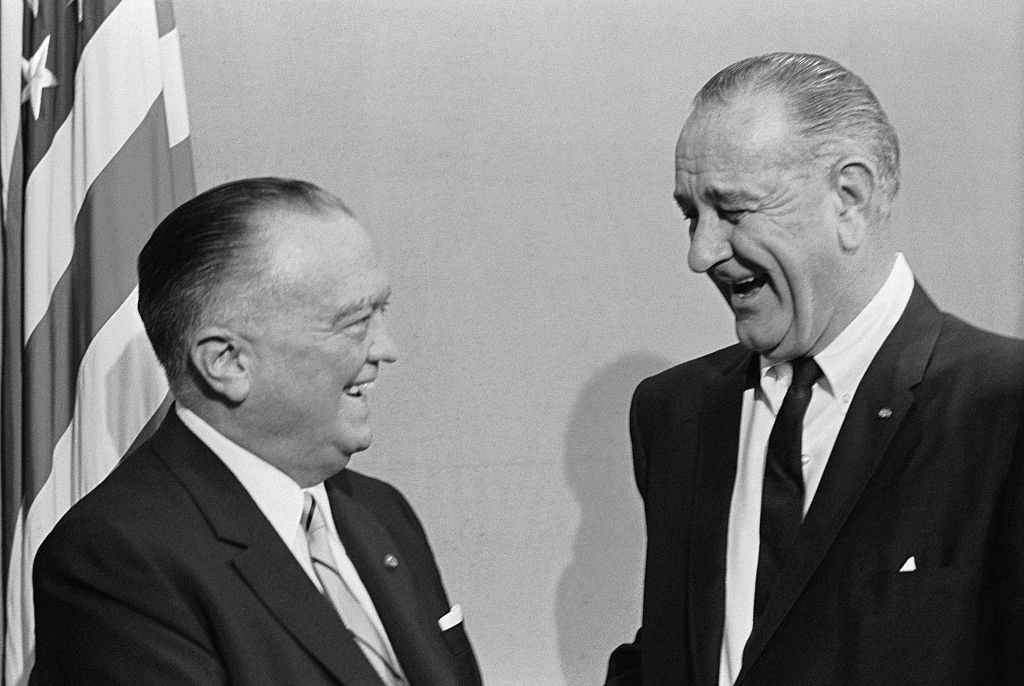 FBI director J. Edgar Hoover (left) has a laugh with President Lyndon Baines Johnson. (Wally McNamee-Corbis/Getty Images)
