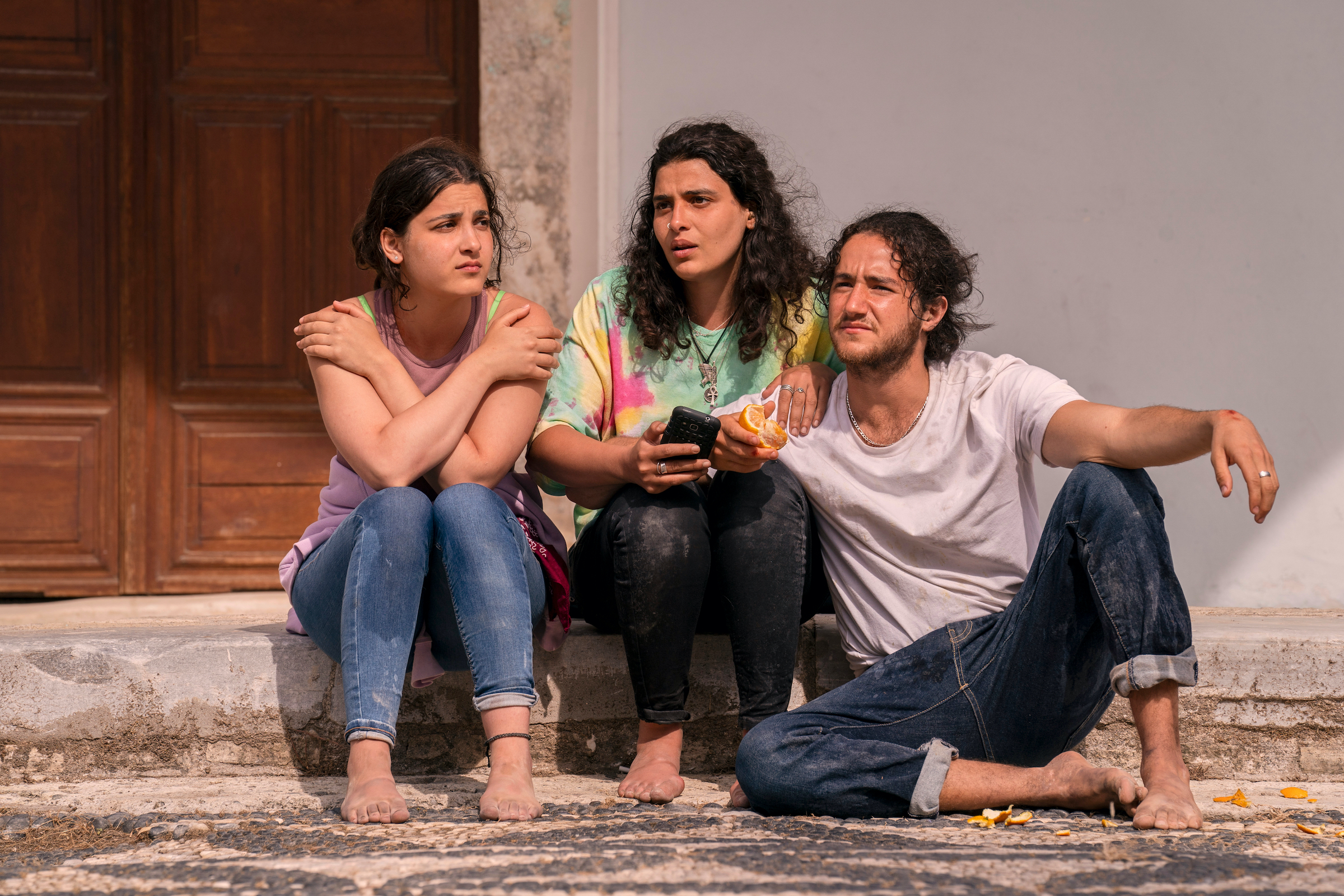 Natalie Issa as Yusra Mardini, Manal Issa as Sara Mardini, Ahmed Malek as Nizar (Laura Radford/Netflix)