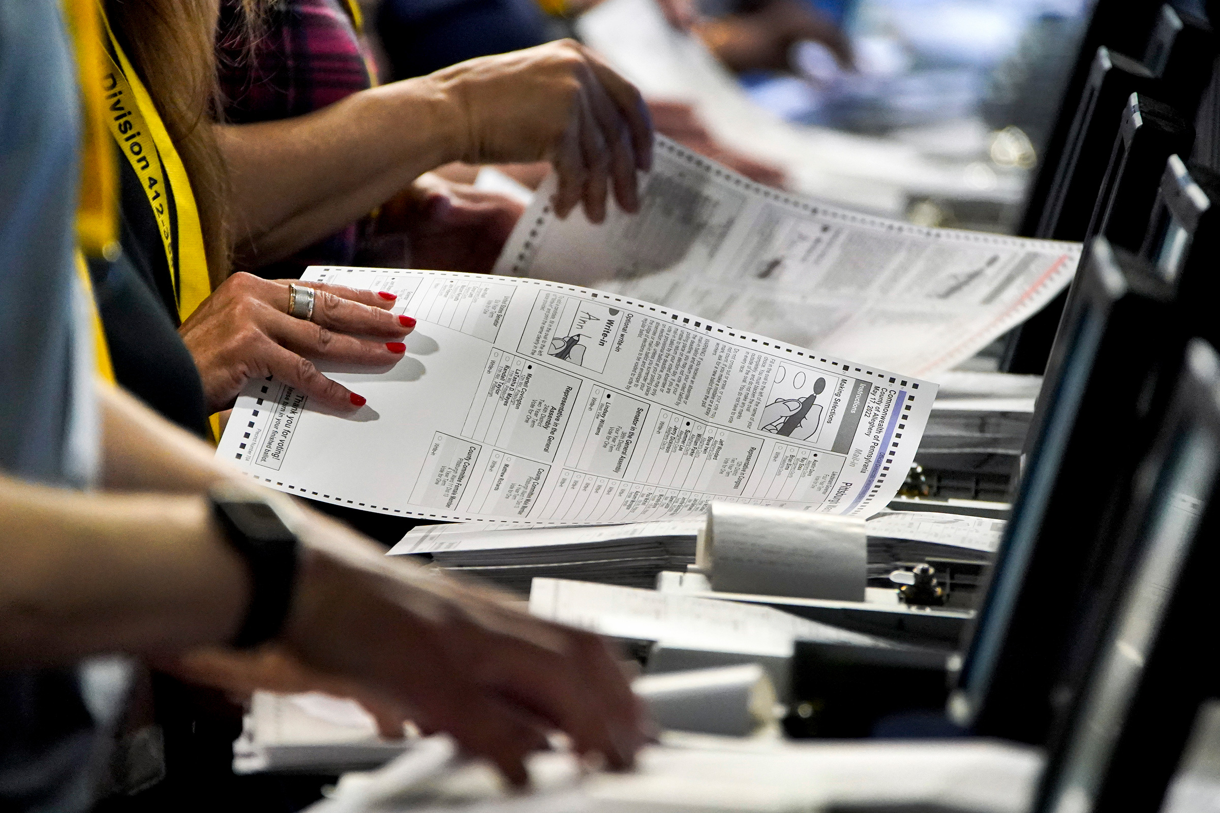 Election workers perform a recount of ballots from the Pennsylvania primary election at the Allegheny County Election Division warehouse in Pittsburgh, Penn., on June 1, 2022. (Gene J. Puskar—AP)