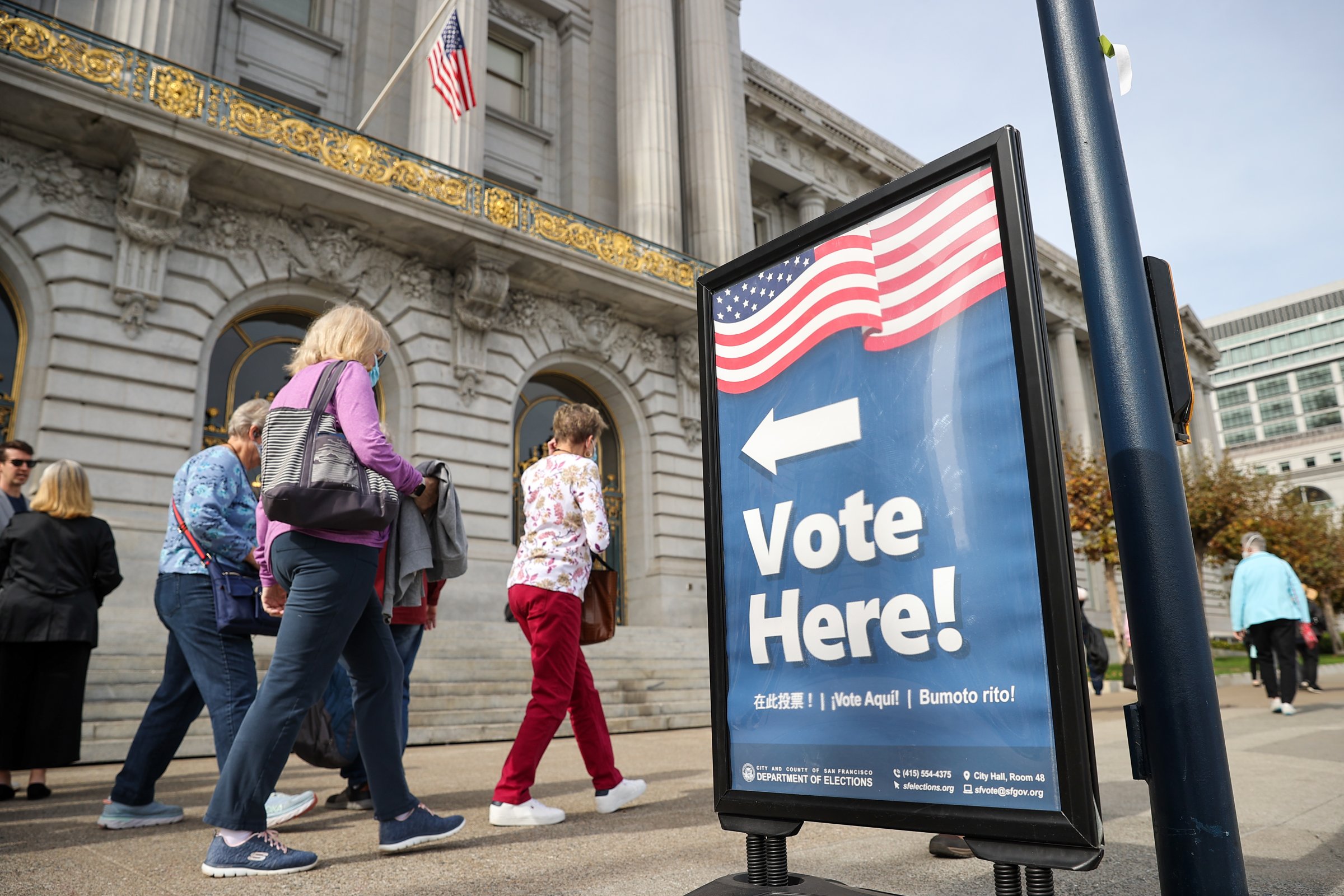 A sign in San Francisco on Oct. 28 directs people to an early voting station for the midterm elections.