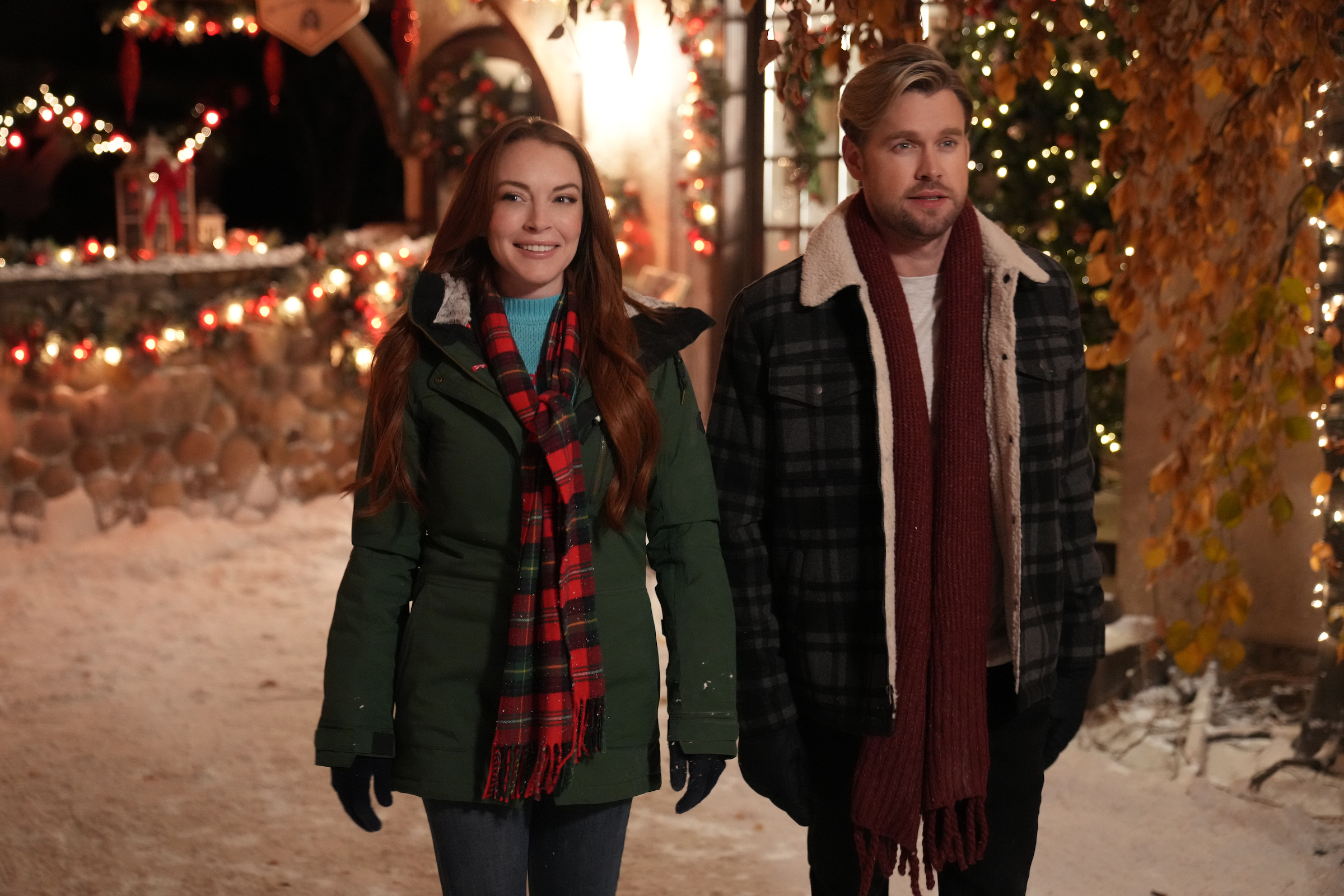 Lindsay Lohan as Sierra, Chord Overstreet as Jake in 'Falling For Christmas' (Scott Everett White—Netflix)