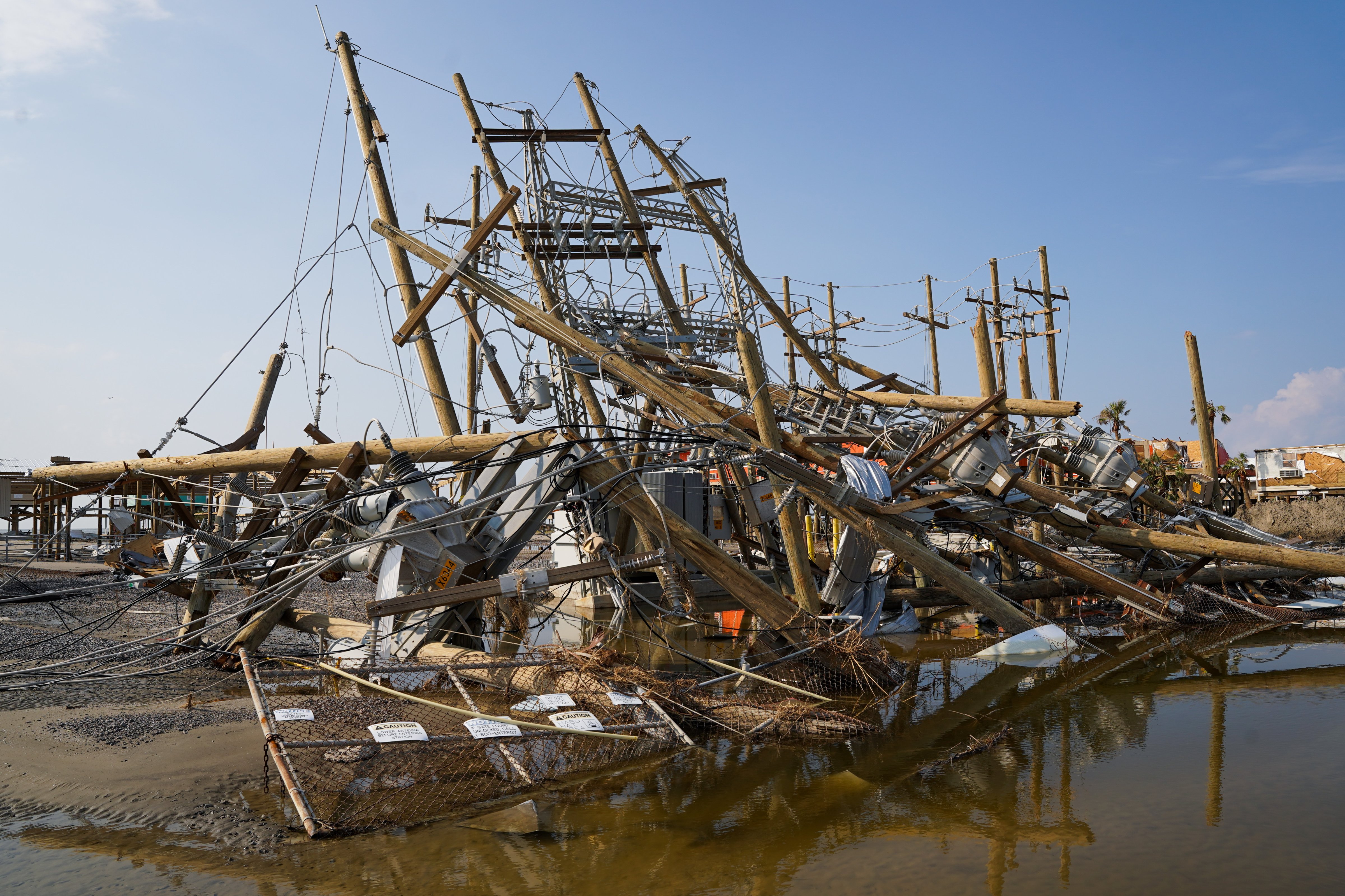 An electrical substation in Grand Isle, La., is left crumpled in the wake of Hurricane Ida on Sept. 4, 2021. (Sean Rayford—Getty Images)
