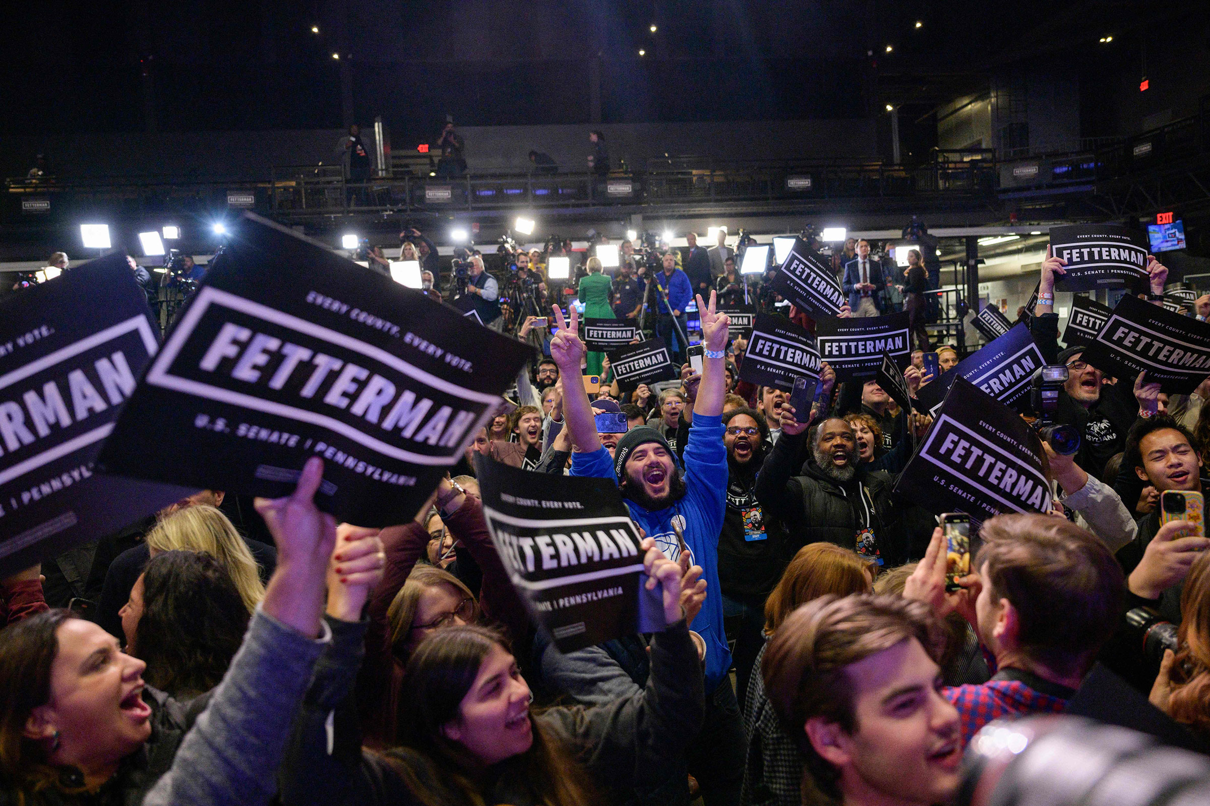 Supporters of John Fetterman react at a midterm election watch party in Pittsburgh, Nov. 8, 2022. (Angela Weiss—AFP/Getty Images)