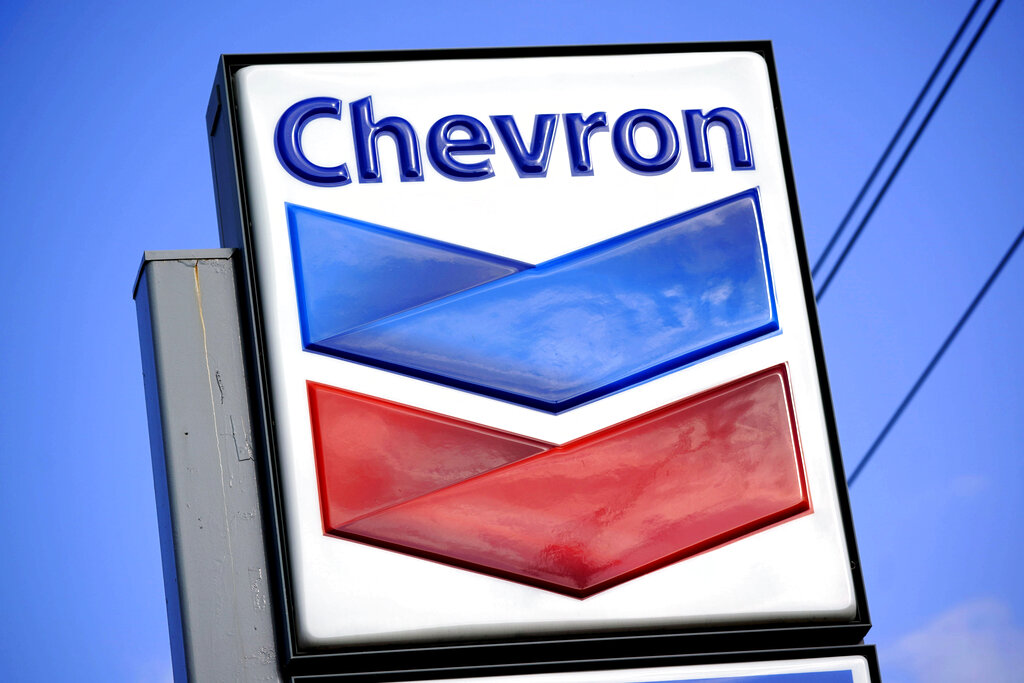 A Chevron sign is displayed outside one of the company's gas stations in Bradenton,  Fla.,  on Feb. 22, 2022. (Gene J. Puskar—AP)