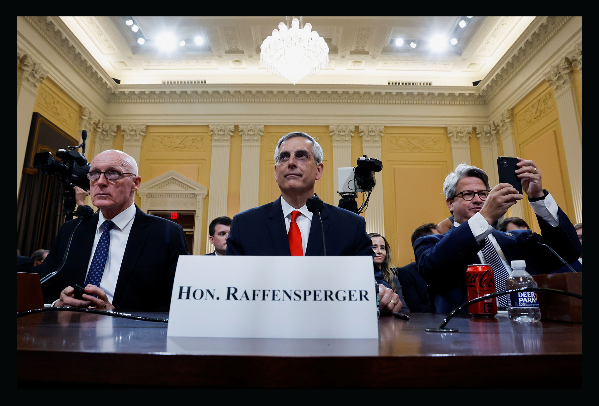 Georgia Secretary of State Brad Raffensperger sits between Arizona House Speaker Rusty Bowers and Georgia Secretary of State Chief Operating Officer Gabriel Sterling during the fourth public hearing of the U.S. House Select Committee to investigate the January 6 Attack on the U.S. Capitol