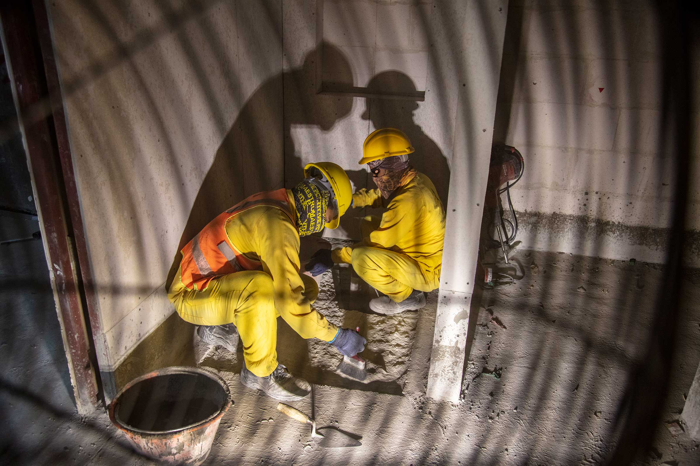 Construction workers in Lusail City switch to cool indoor work when the temperature rises. (Ed Kashi—VII for TIME)