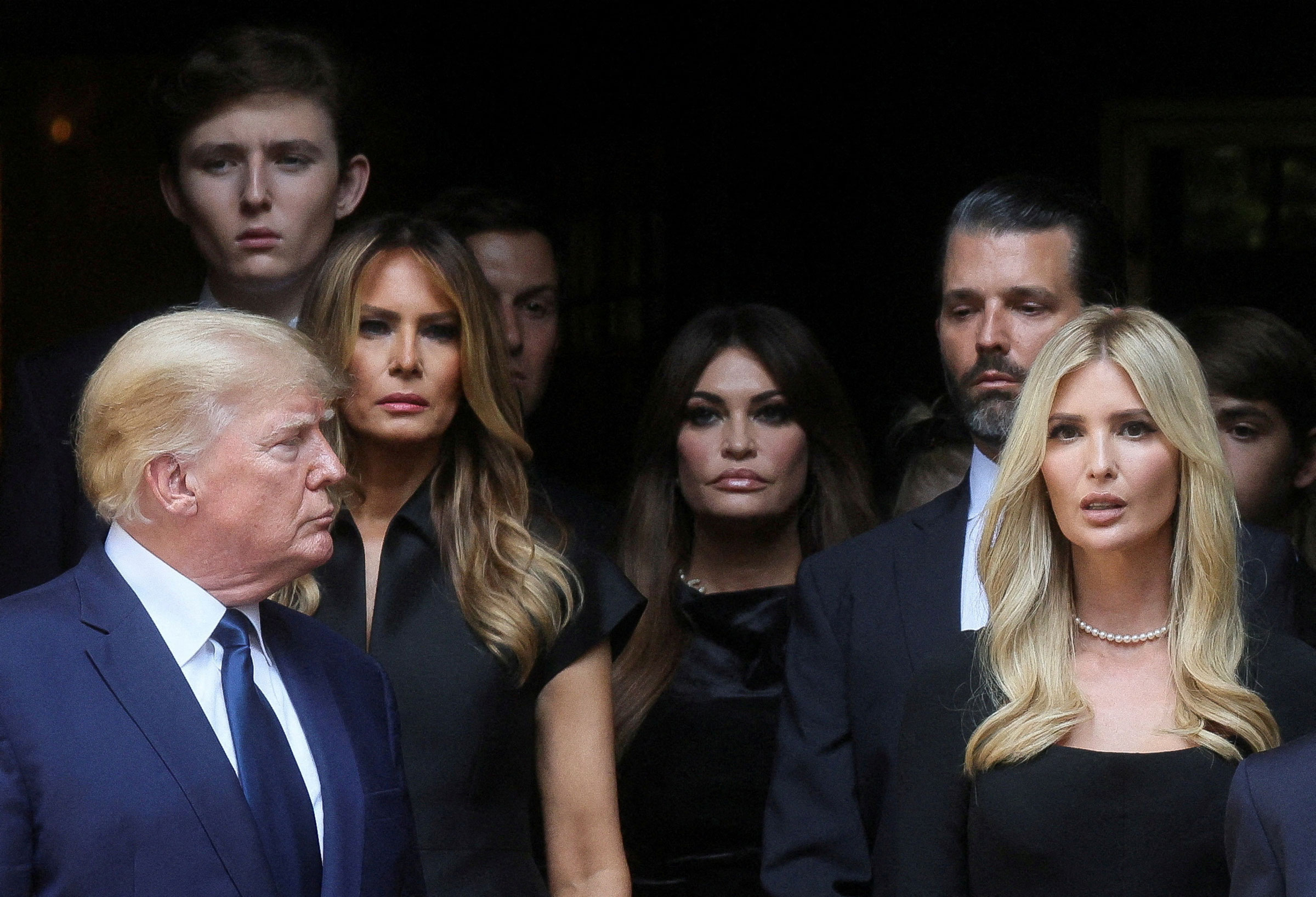 Former U.S. President Donald Trump, his wife Melania, Kimberly Guilfoyle, his sons Barron and Donald Jr. and his daughter Ivanka leave St. Vincent Ferrer Church during the funeral of Ivana Trump, socialite and Trump's first wife, in New York City, on July 20.