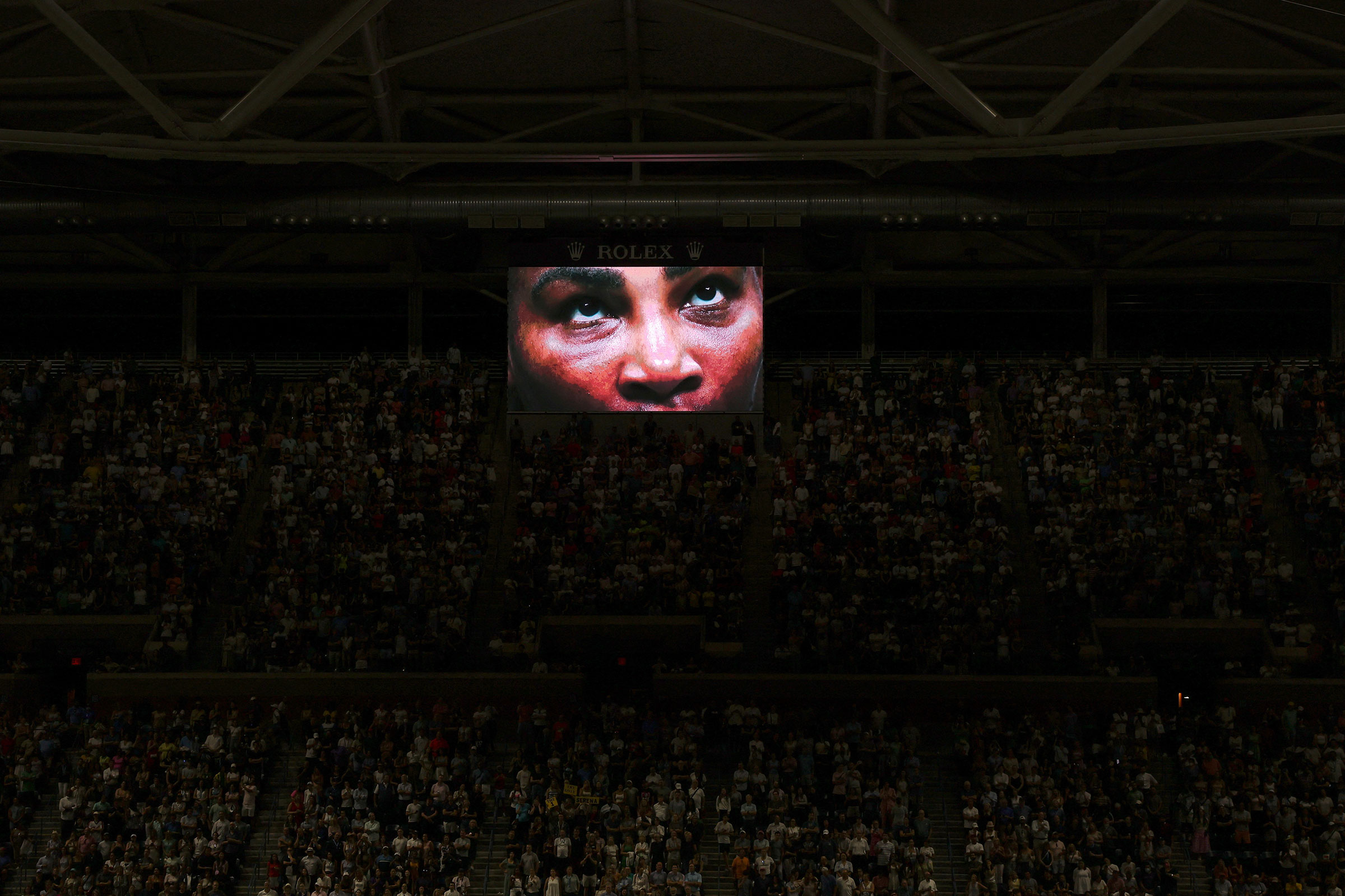 Serena Williams is seen on a video monitor tribute after winning her second round match against Estonia's Anett Kontaveit at the U.S. Open in New York on Aug. 31. (Shannon Stapleton—Reuters)