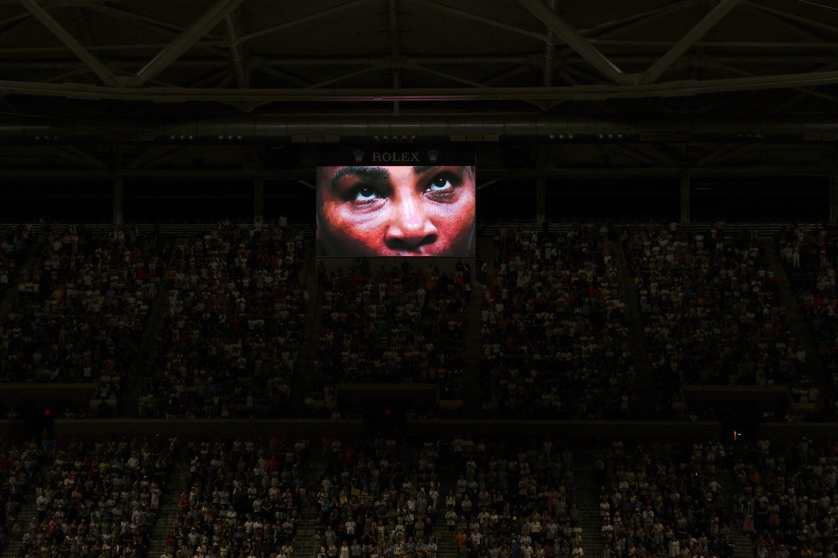Serena Williams is seen on a video monitor tribute after winning her second round match against Estonia's Anett Kontaveit at the U.S. Open in New York on Aug. 31.