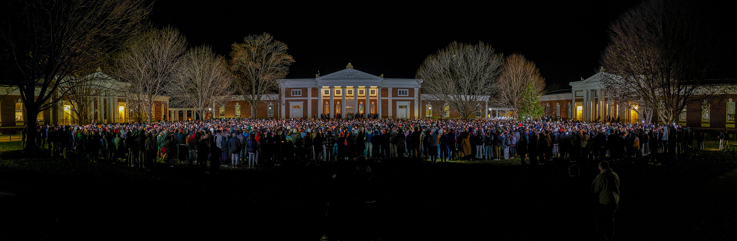 Thousands of students gather together on the University of Virginia's South Lawn on Nov. 14 for a moment of silence to honor the three students killed—Devin Chandler, Lavel Davis Jr., and D’Sean Perry—and two wounded in a shooting on Nov. 13.