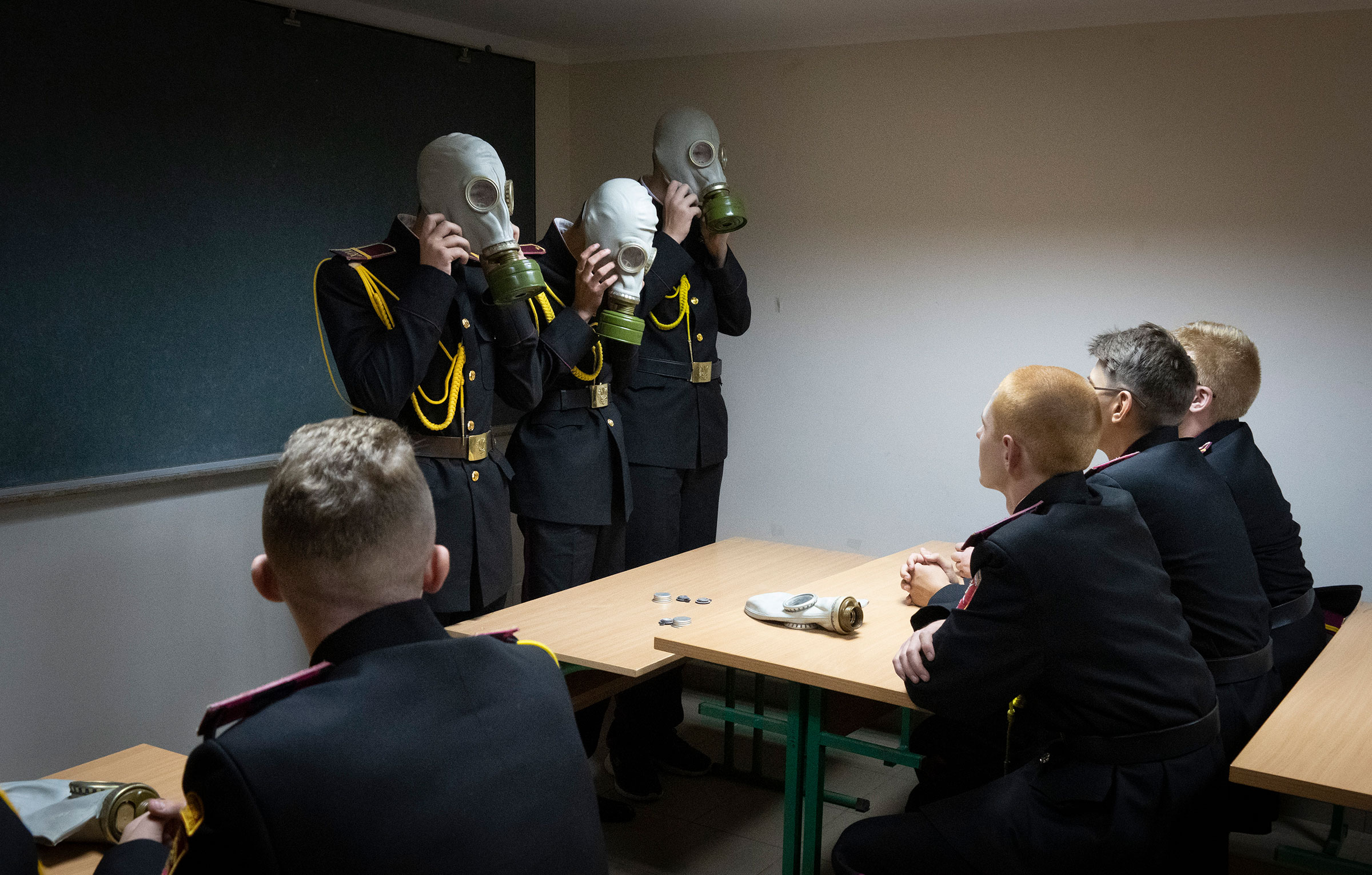 Cadets practice an emergency situation during a lesson in a bomb shelter on the first day of school at a cadet lyceum in Kyiv, Ukraine, on Sept. 1. (Efrem Lukatsky—AP)