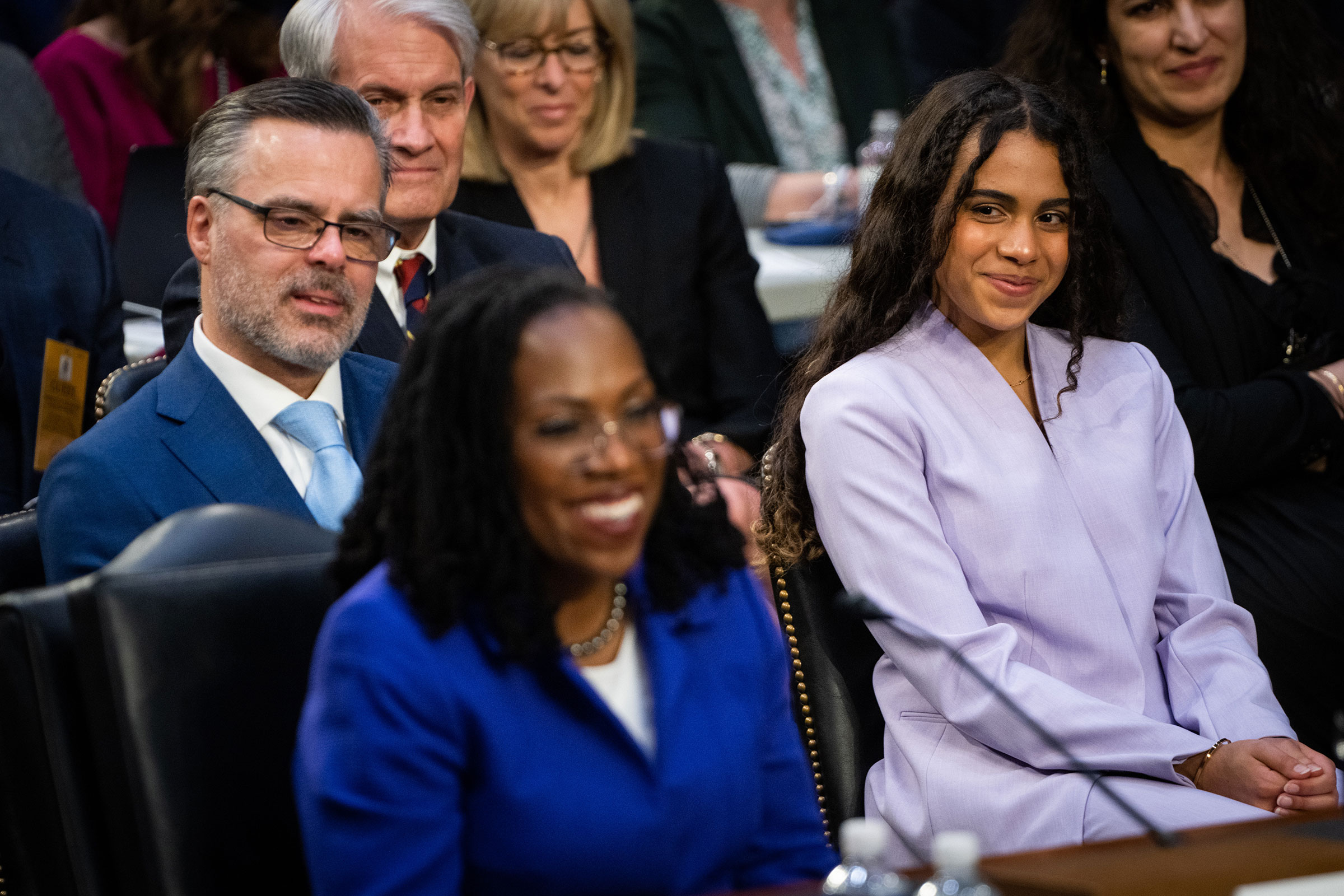 Patrick Jackson, left, husband of Supreme Court nominee Ketanji Brown Jackson, center, and daughter Leila Jackson, right, look on during confirmation hearings in Washington,on March 21.