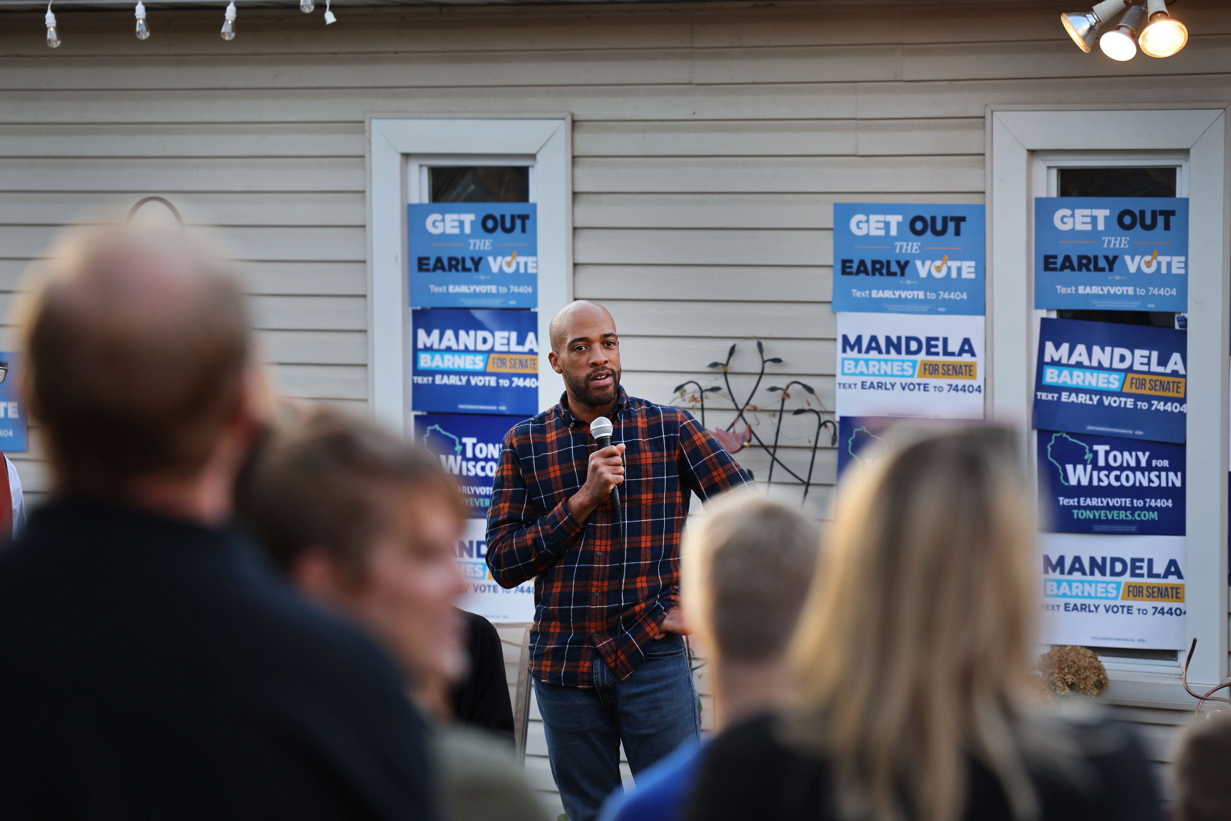 Democratic U.S. Senate candidate, Wisconsin Lt. Gov. Mandela Barnes, speaks with supporters at a campaign rally in Madison, Wis., on Nov.2, 2022.
