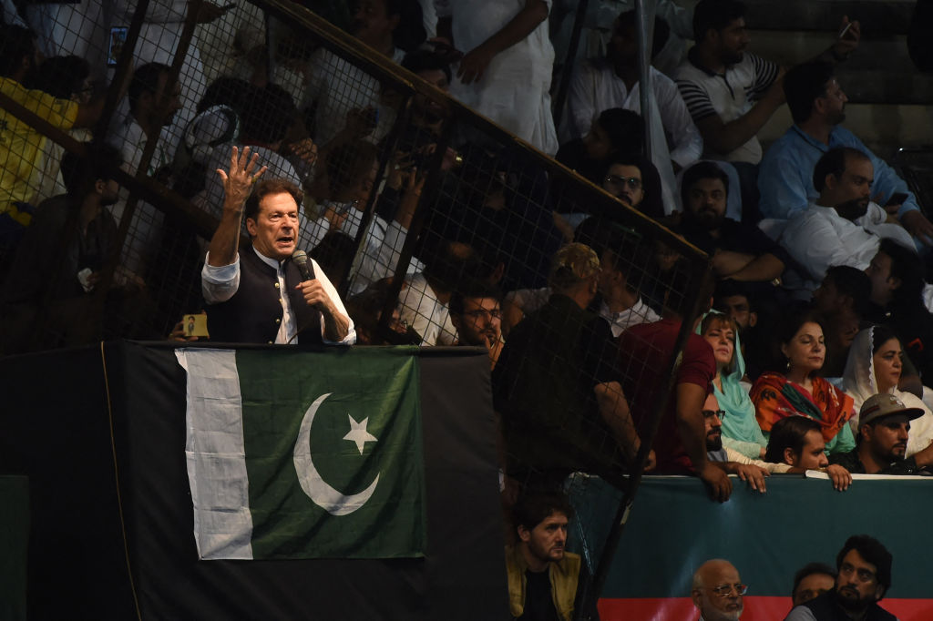 Pakistan's former Prime Minister Imran Khan delivers a speech to his supporters during a rally to celebrate the 75th anniversary of Pakistan's independence day in Lahore on Aug. 13, 2022. (Arif Ali—AFP via Getty Images)