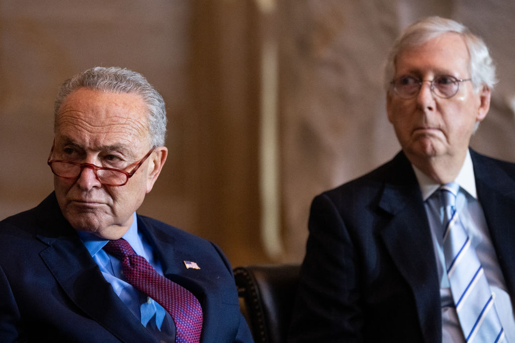 Senate Majority Leader Chuck Schumer, D-N.Y., left, and Senate Minority Leader Mitch McConnell, R-Ky., in the Capitol Rotunda on Dec. 6, 2022. (Bill Clark—CQ-Roll Call, Inc via Getty Images)