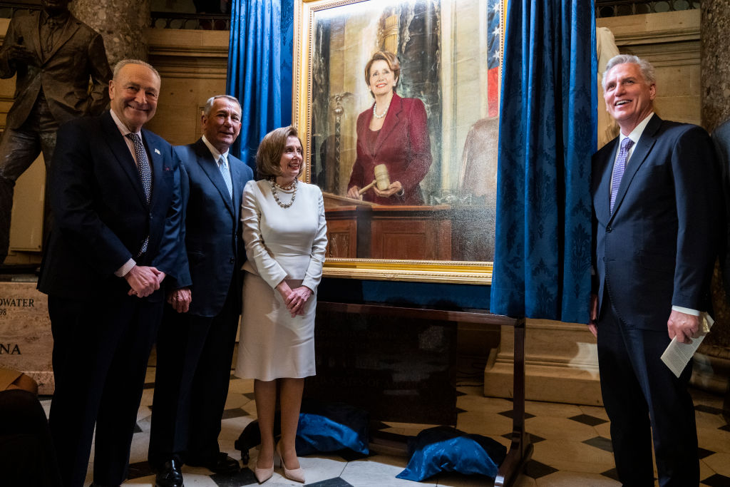 From left: Senate Majority Leader Charles Schumer, former House Speaker John Boehner, outgoing Speaker Nancy Pelosi, and House Minority Leader Kevin McCarthy, attend a portrait unveiling ceremony for Pelosi in the U.S. Capitol on December 14, 2022. (Tom Williams—CQ-Roll Call, Inc via Getty Images)