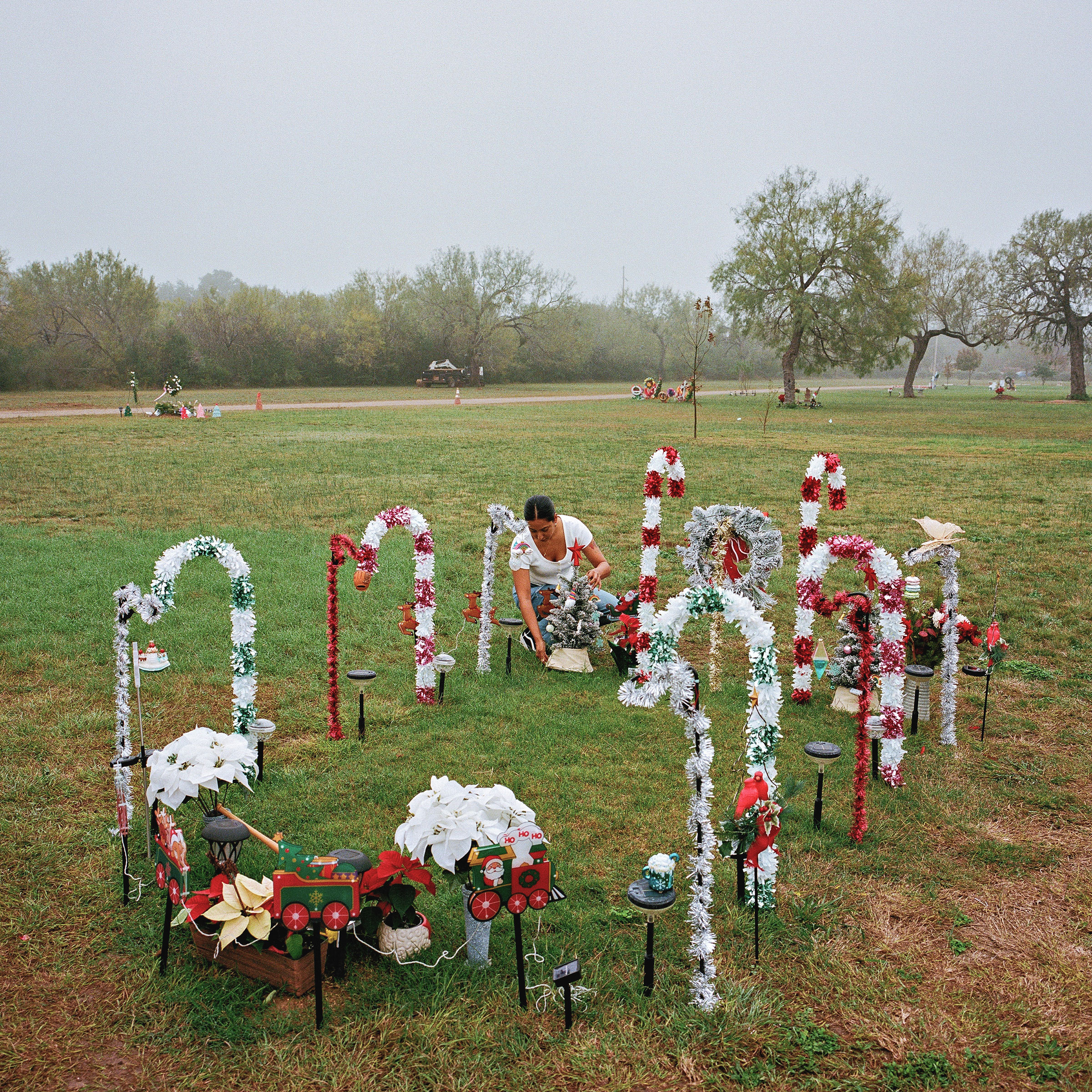Uvalde, Texas - December 12, 2022:Kimberly , the mother of Lexi Rubio who was killed at the Robb Elementary School shooting earlier this year, visited plot at the cemetery where Lexi’s body was buried Uvlade, Texas on December 12, 2022. The parents, who decorate the plot based on holidays, visit daily. Photo: Christopher Lee for TIME