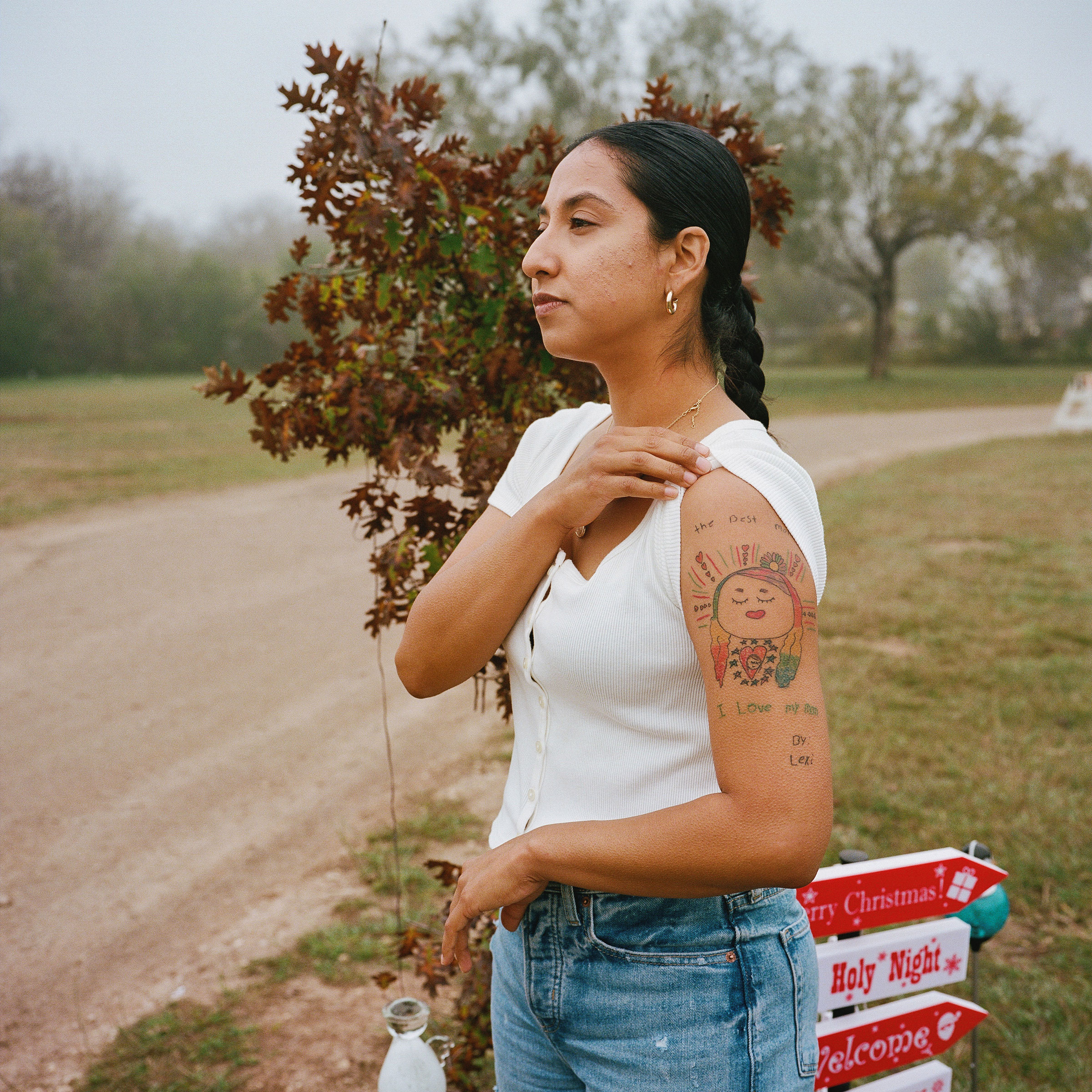 Kimberly Mata-Rubio, the mother of Lexi Rubio, shows a tattoo of a drawing by Lexi that she got in honor of her in Uvlade, Texas on Dec. 12, 2022. (Christopher Lee for TIME)