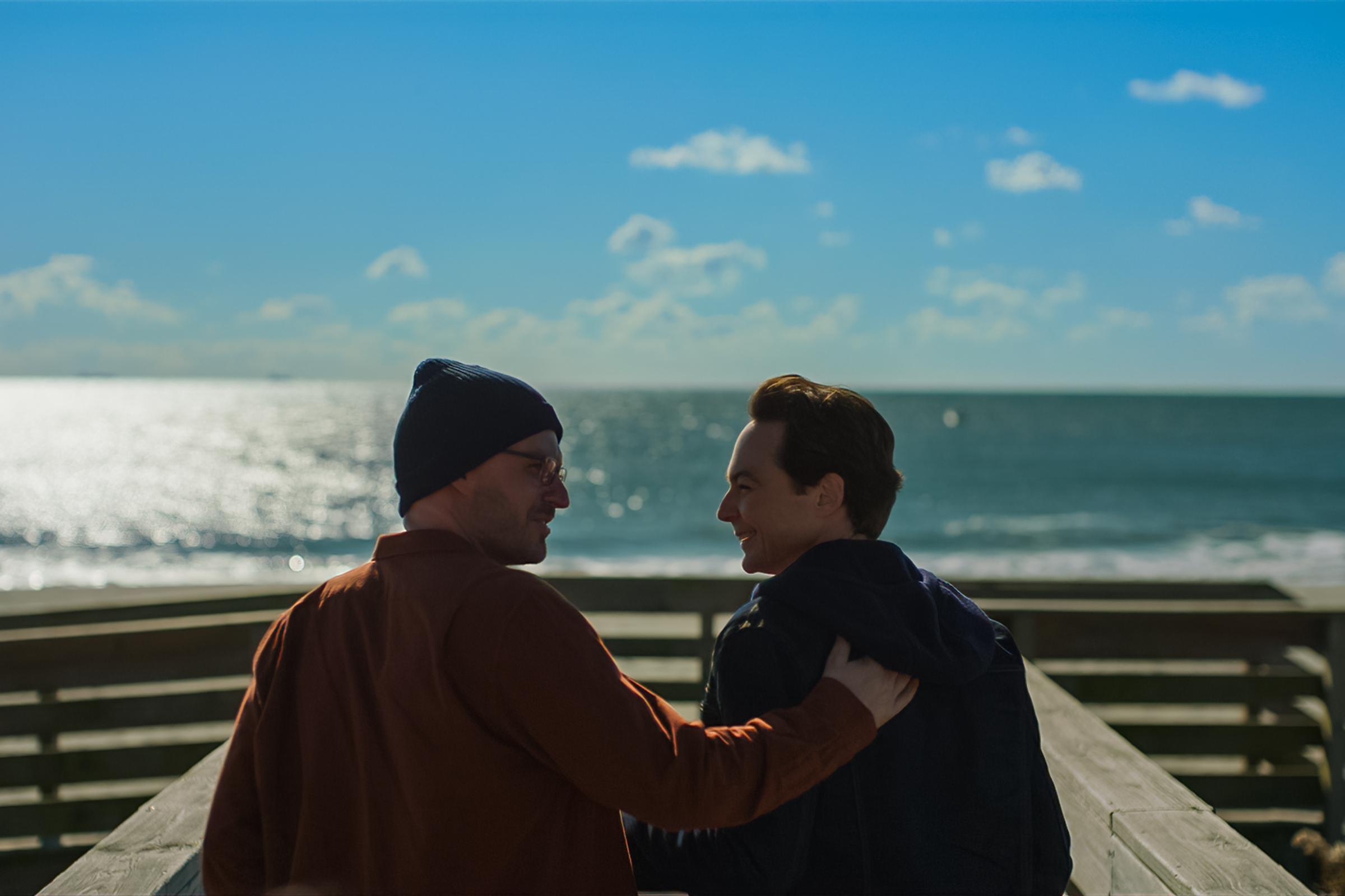 Ben Aldridge and Jim Parsons on a boardwalk